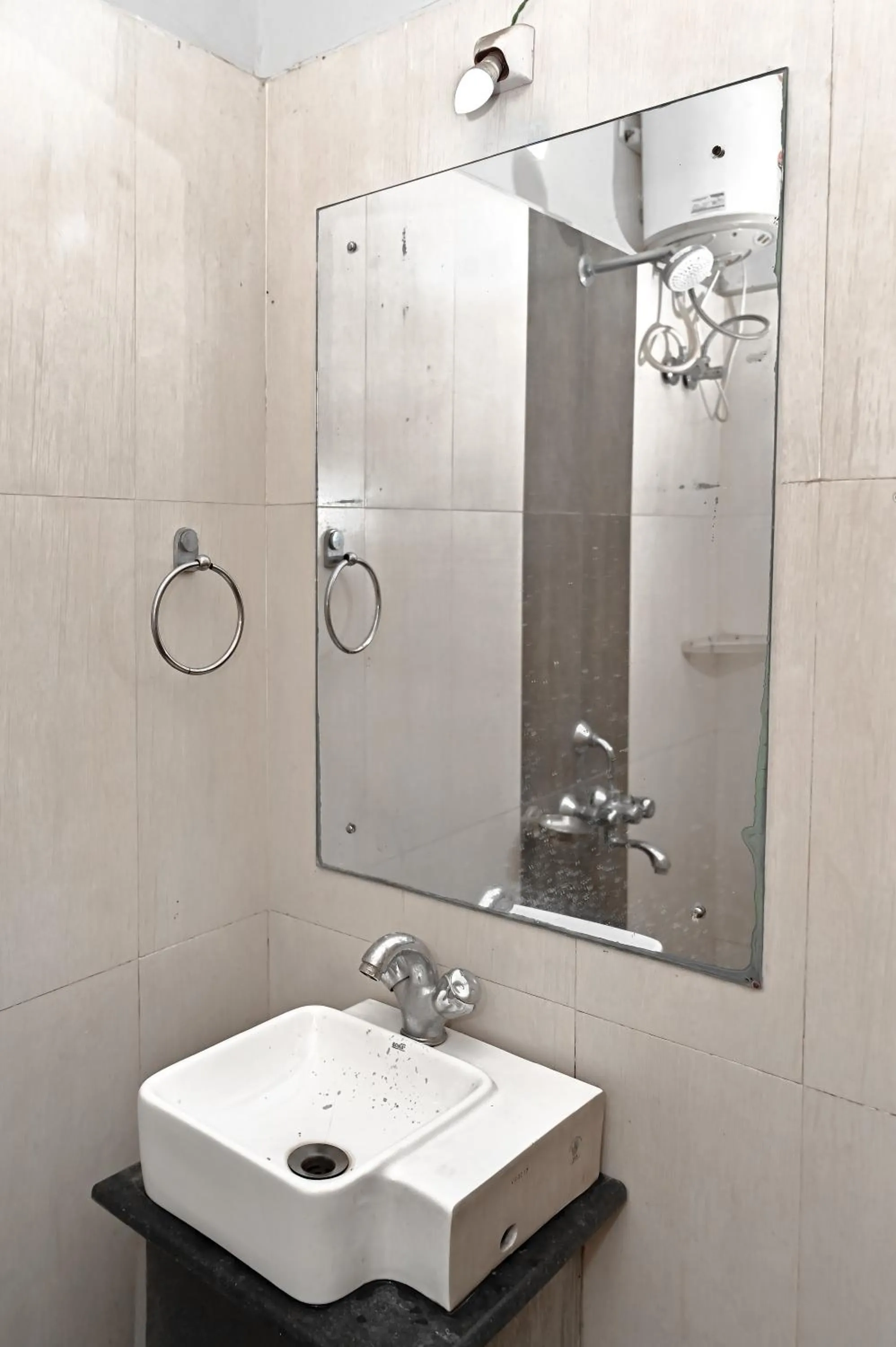 Bathroom in Holiday Inn Guest House Near Nemcare Hospital