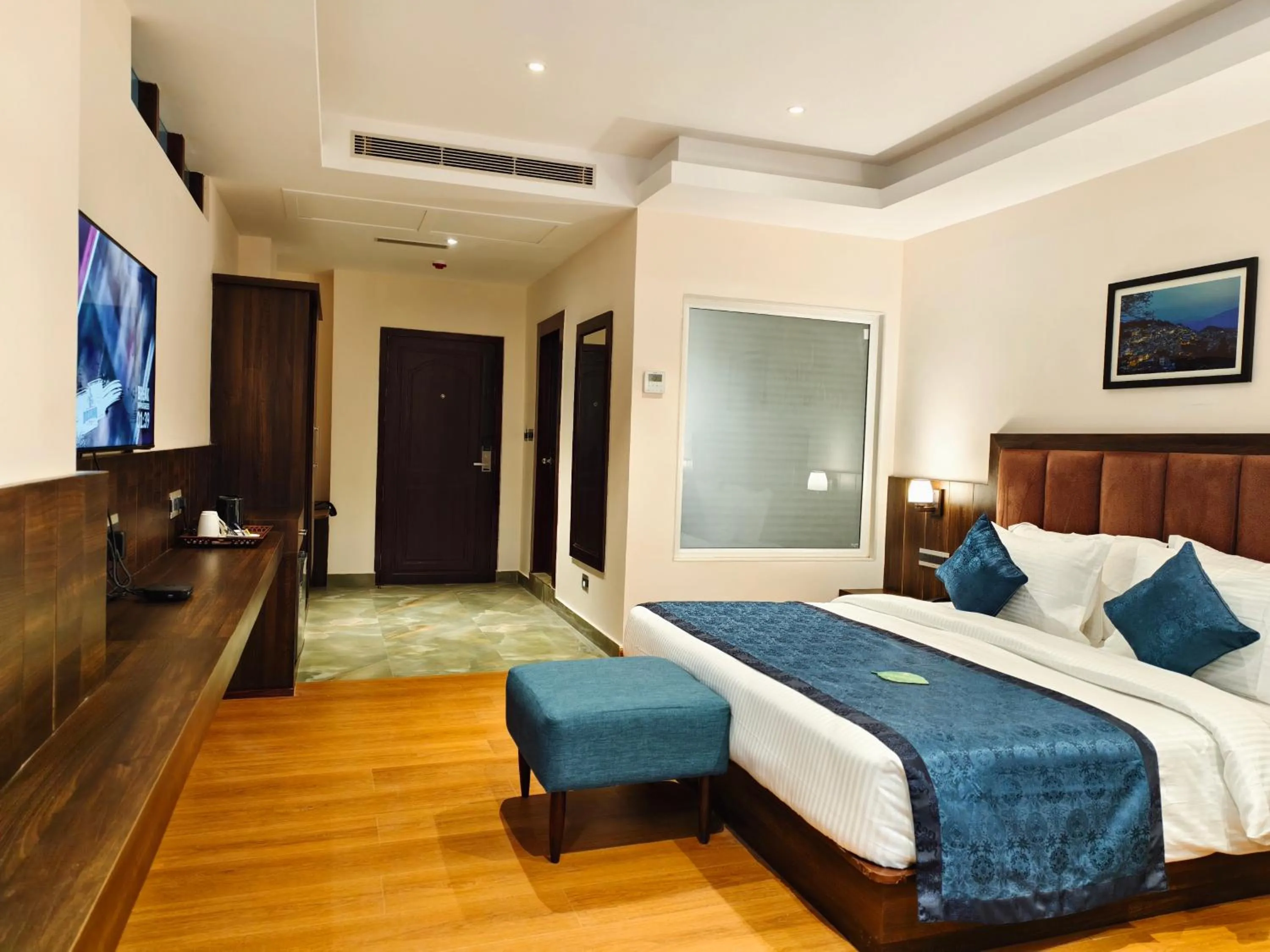Photo of the whole room, Bed in Clarion Hotel De Renees Gangtok