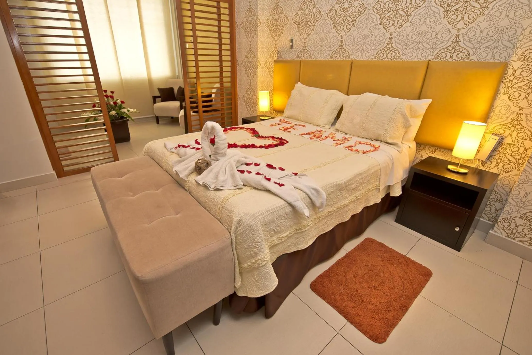 Bed in Plaza Sur Hotel & Suites