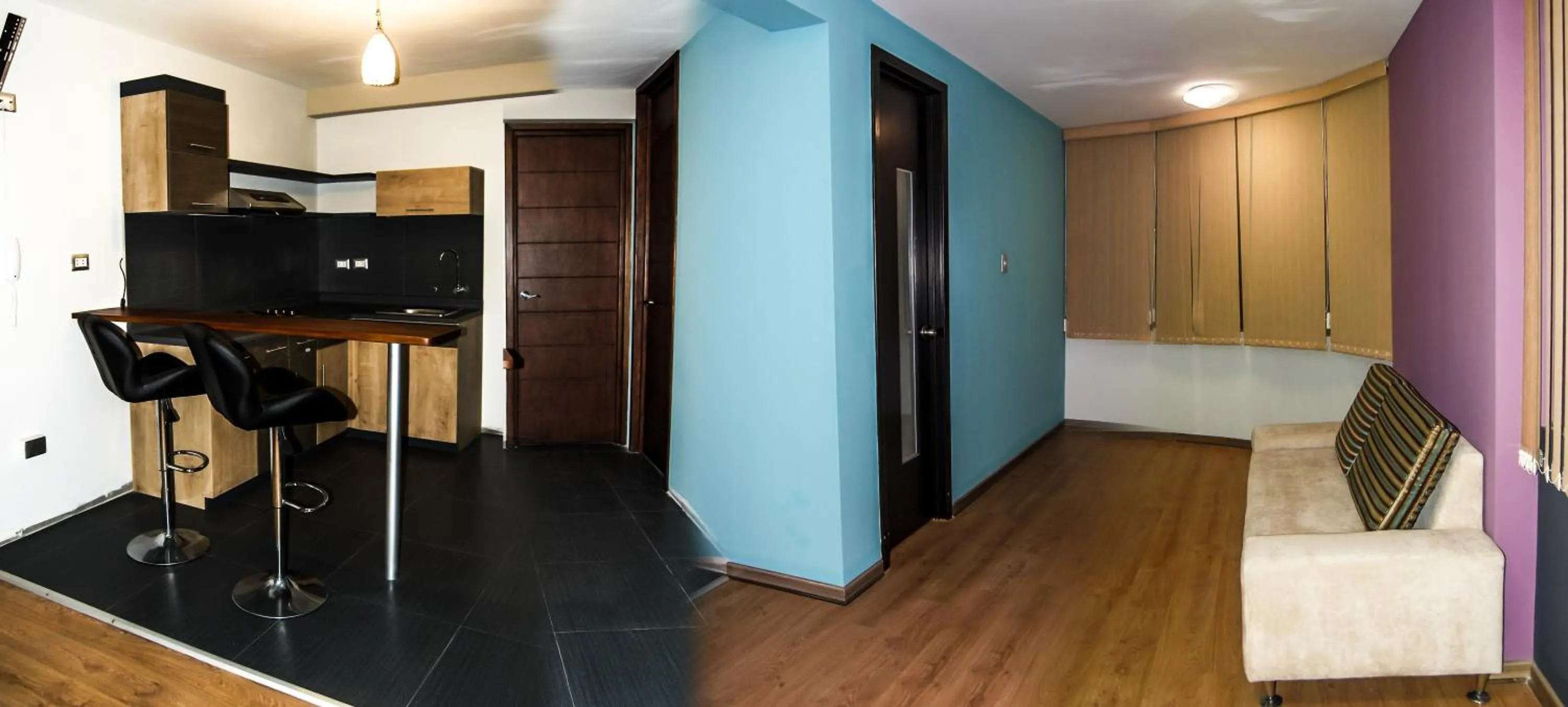 Kitchen or kitchenette in Plaza Sur Hotel & Suites