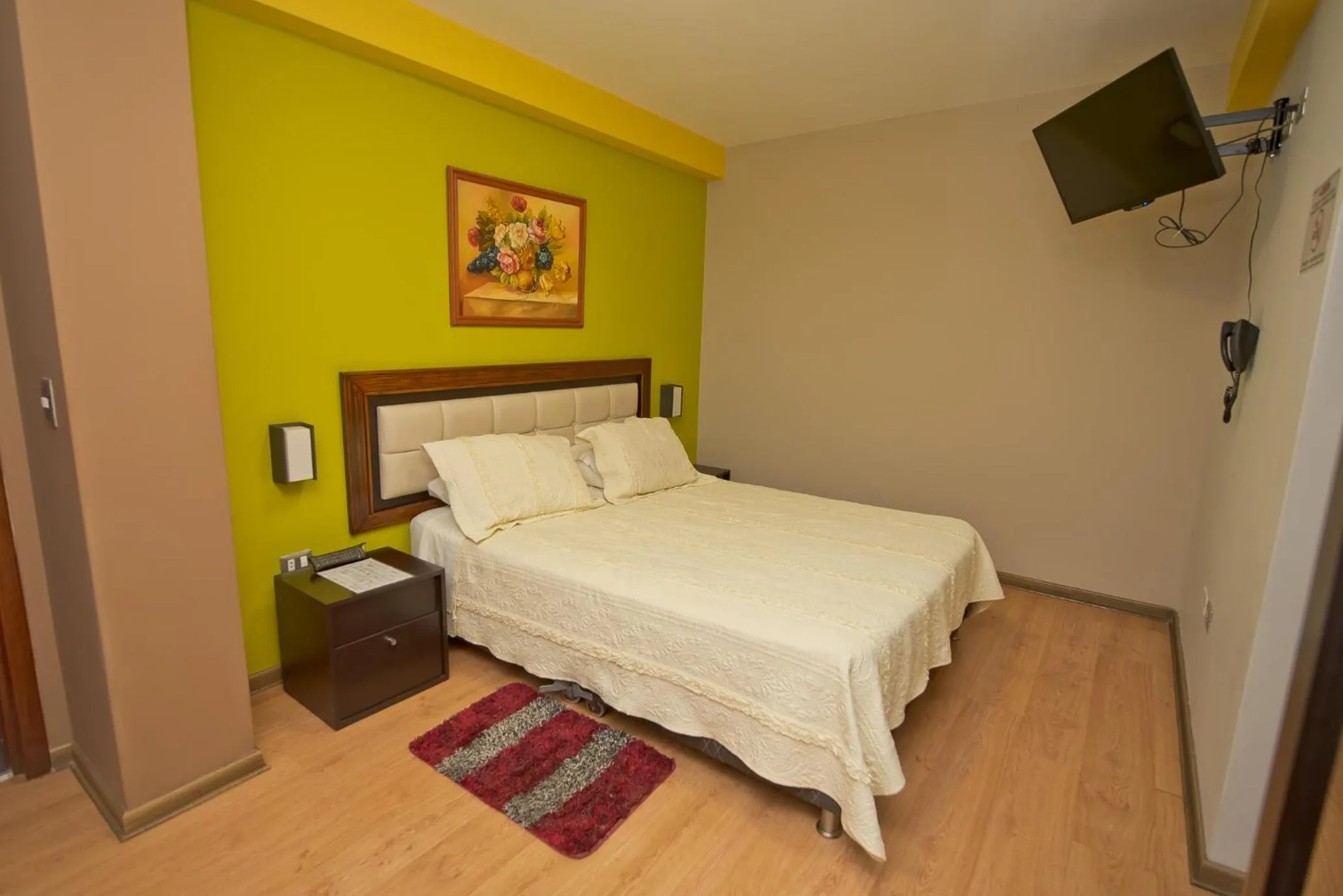 Bed in Plaza Sur Hotel & Suites