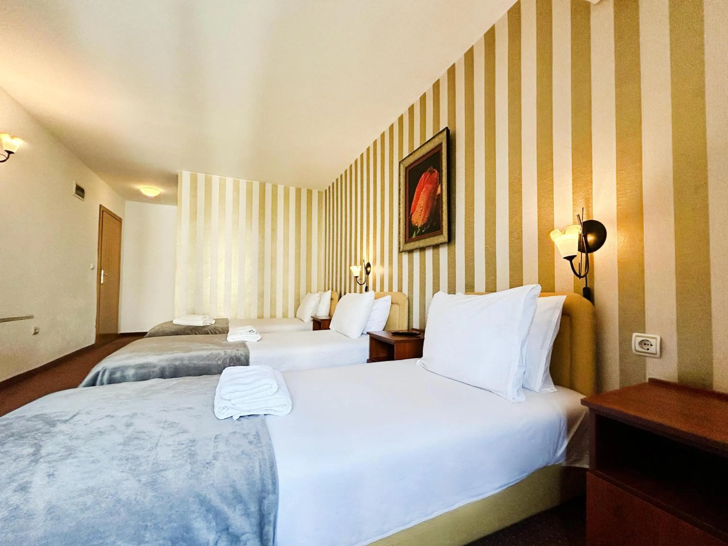 Photo of the whole room, Bed in Central Hotel & Restaurant