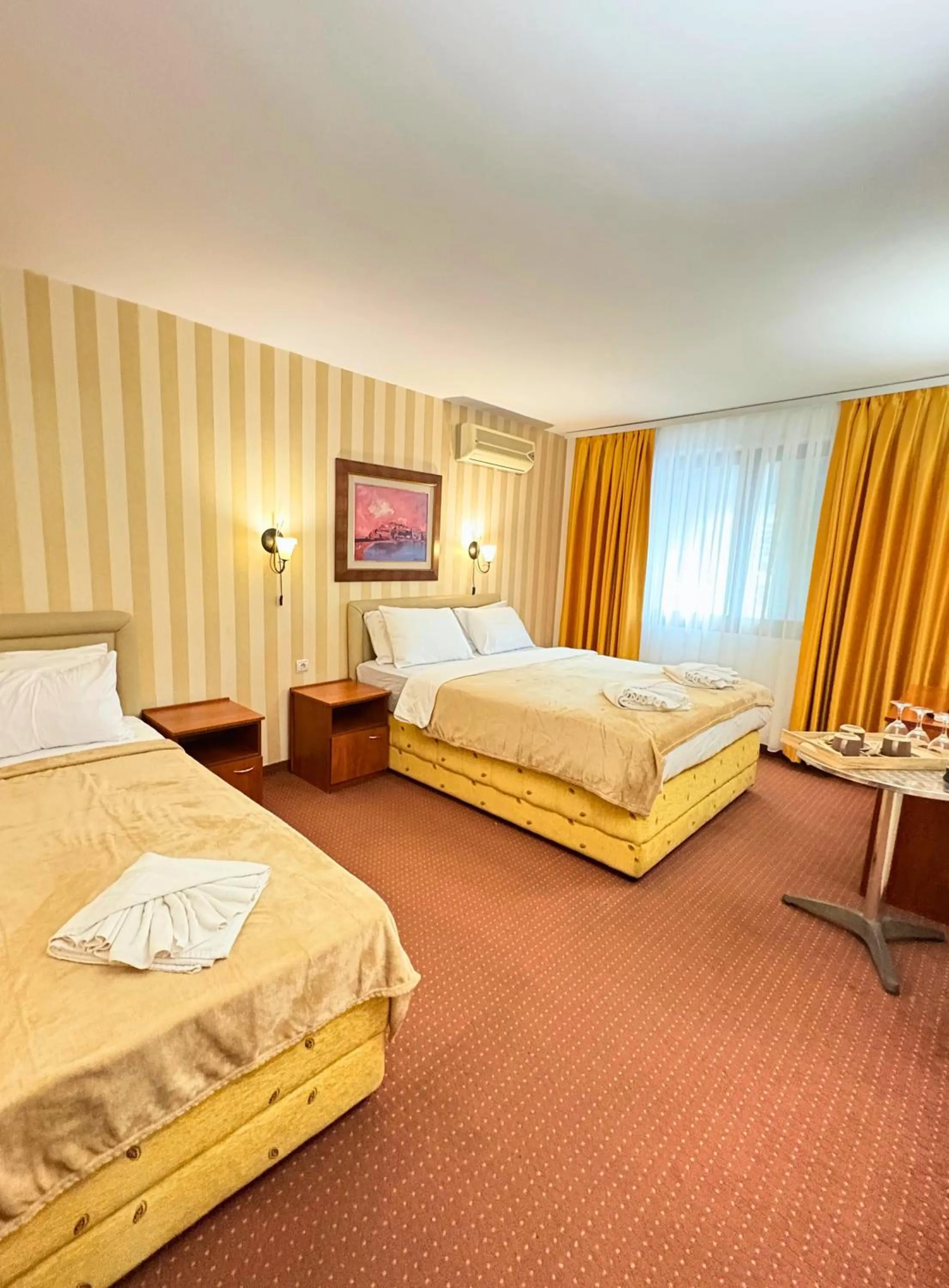 Photo of the whole room, Bed in Central Hotel & Restaurant