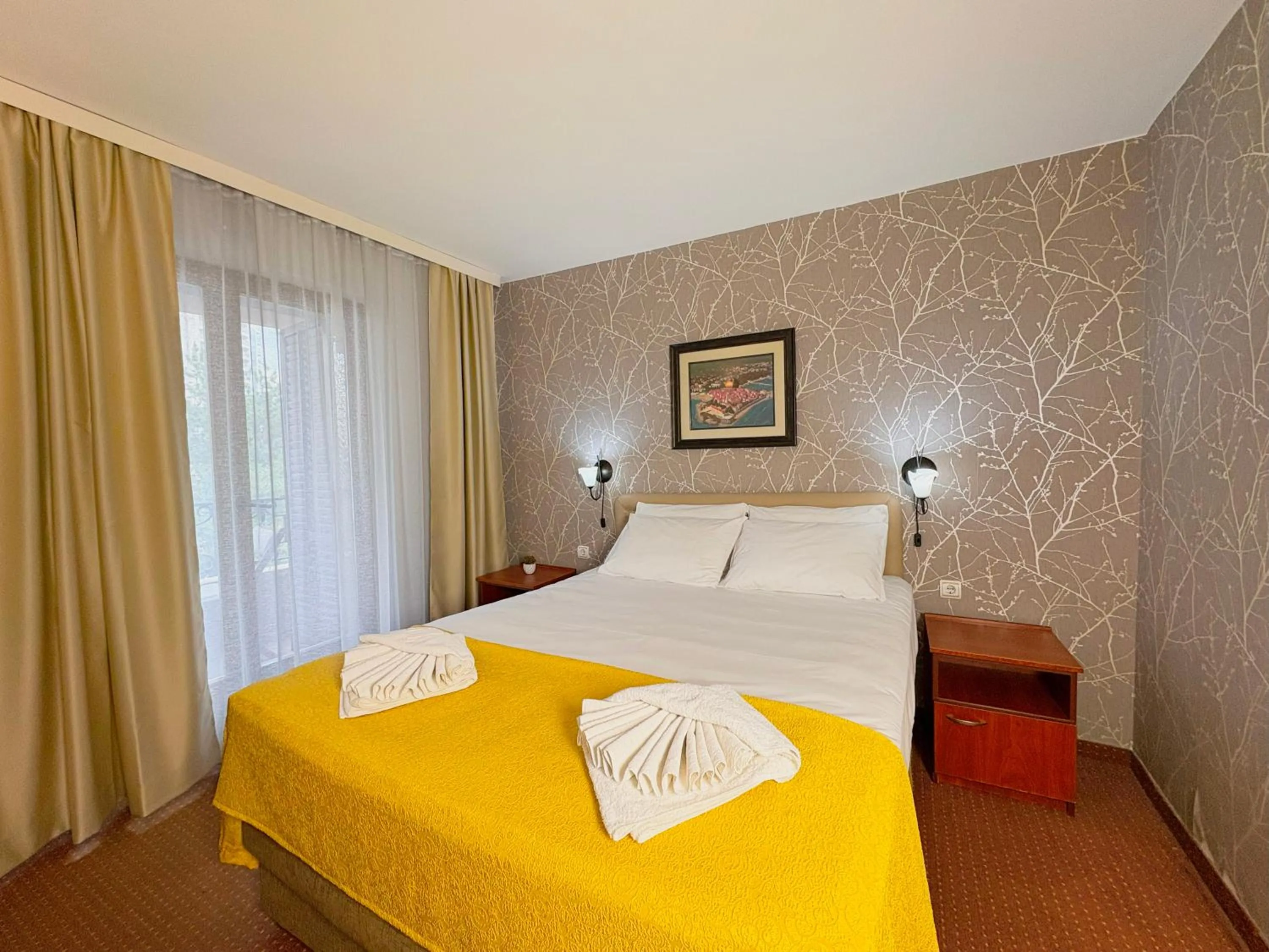 Bed in Central Hotel & Restaurant