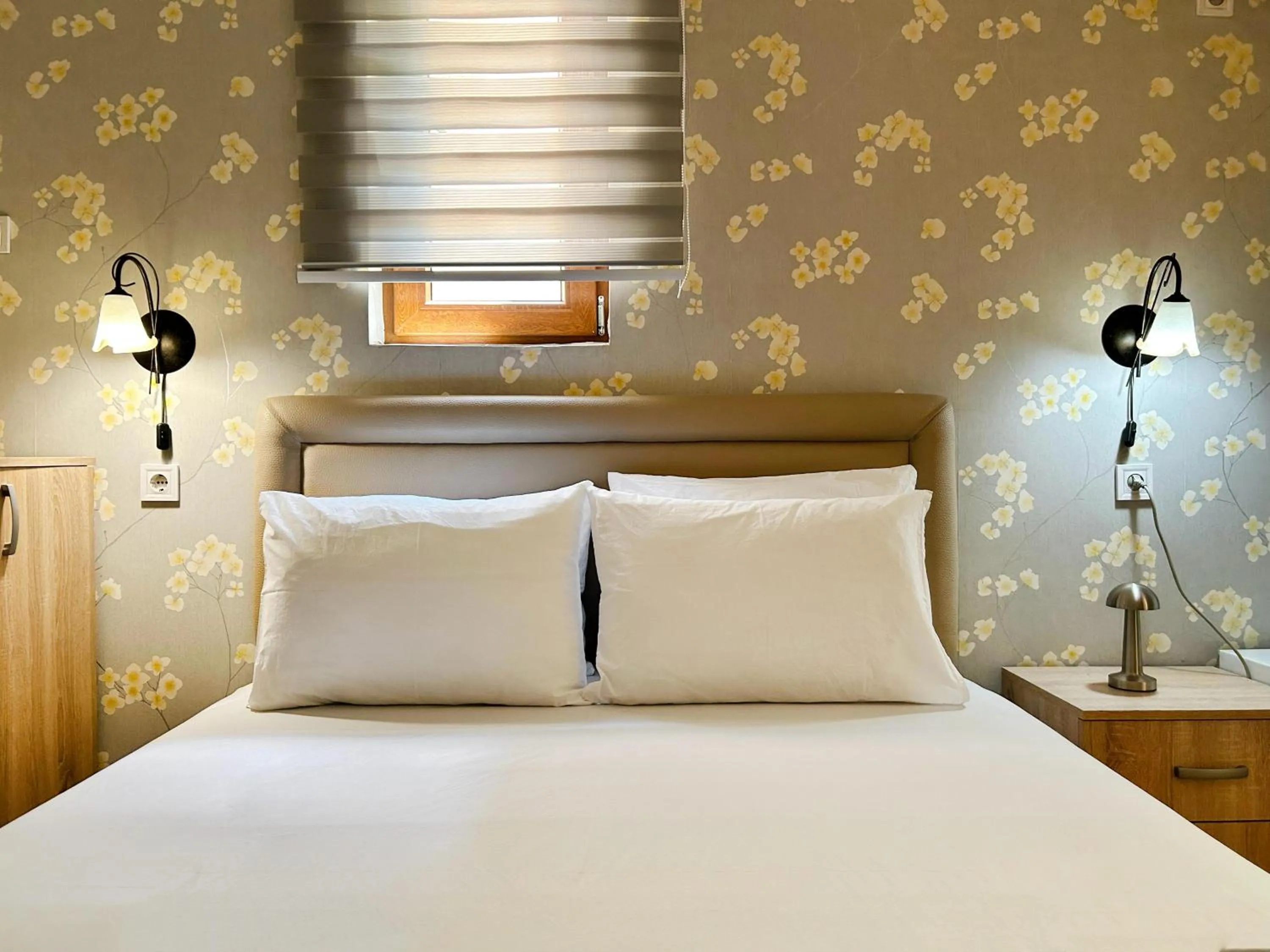 Bed in Central Hotel & Restaurant