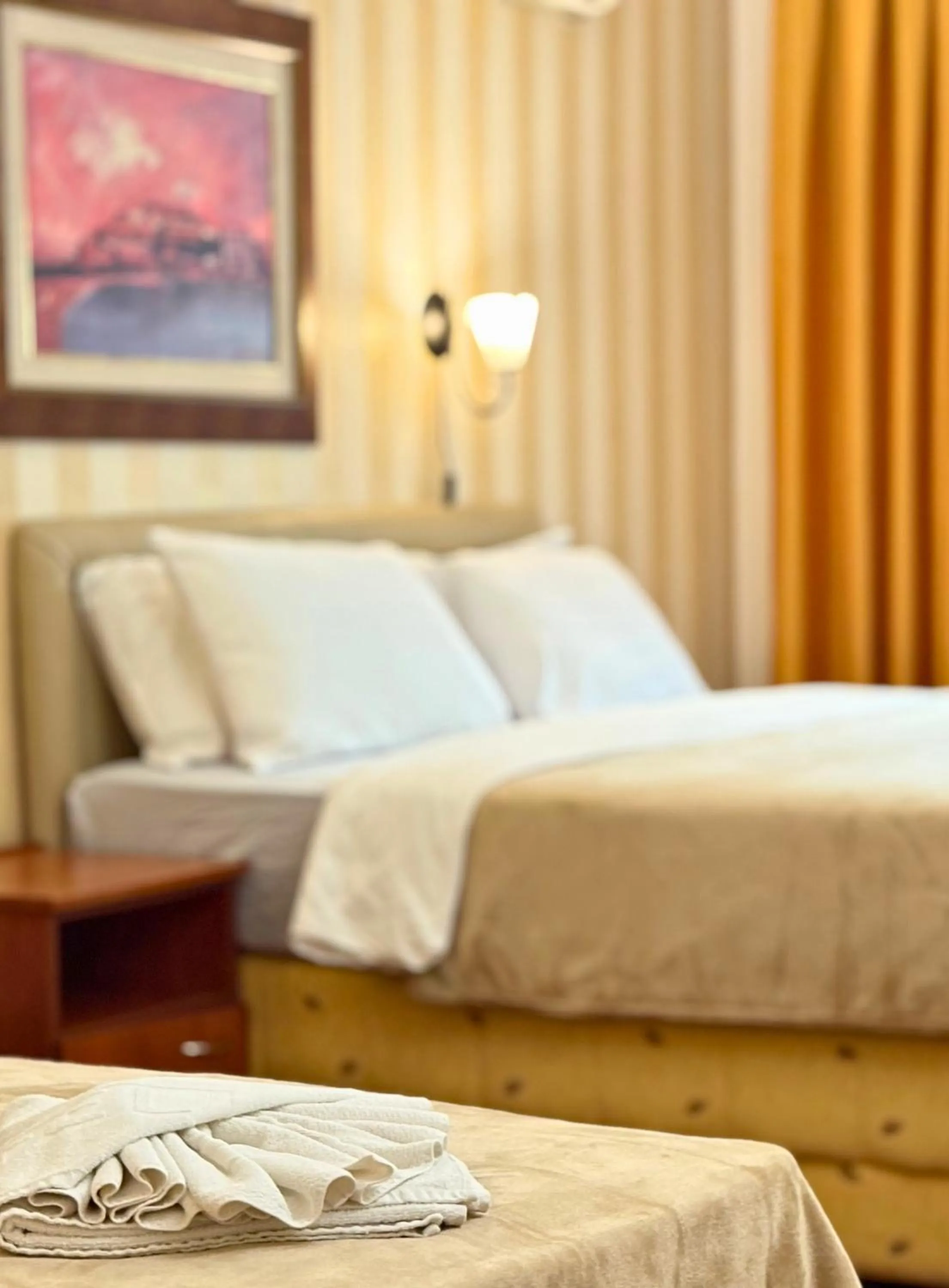 Bed in Central Hotel & Restaurant