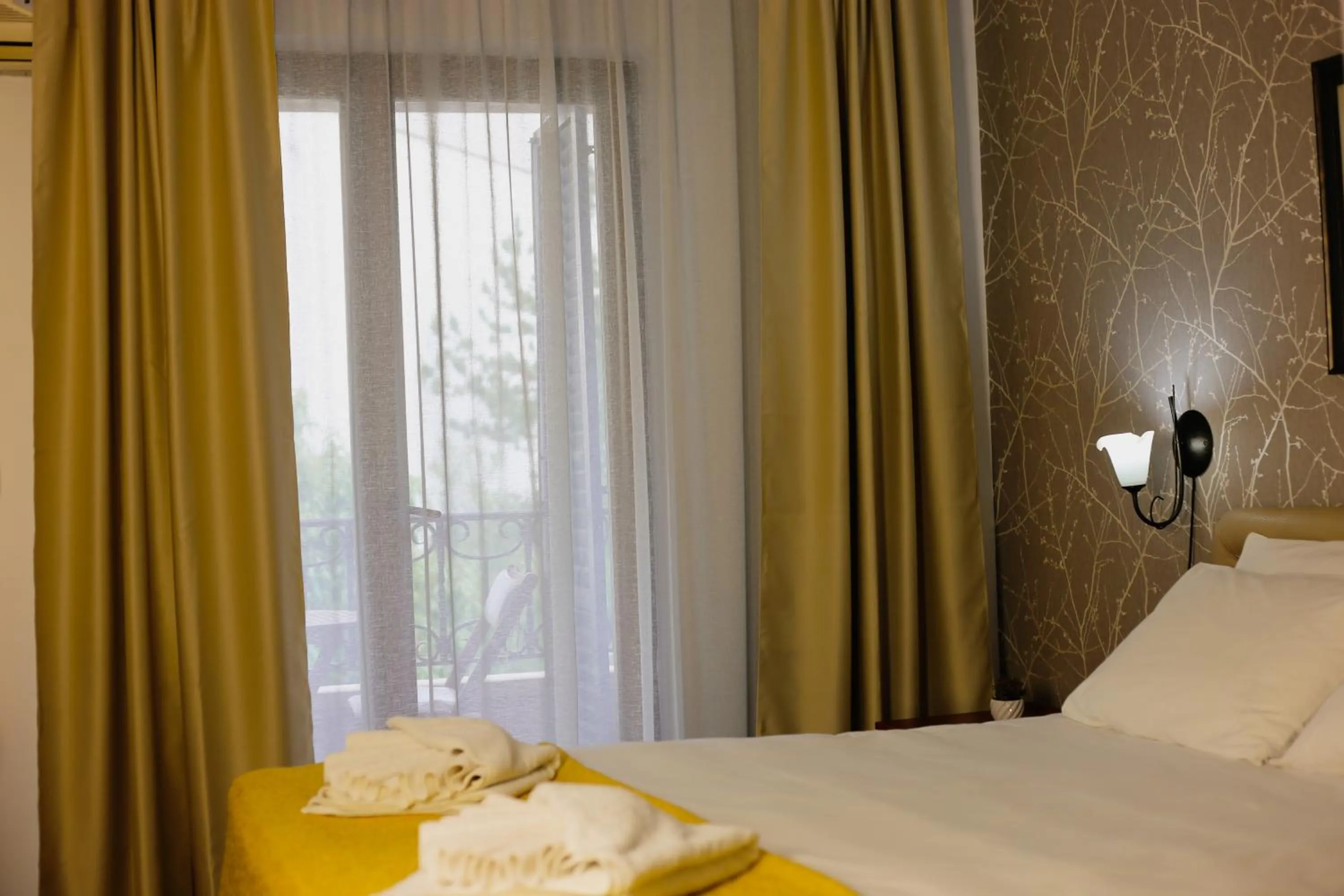 Bed in Central Hotel & Restaurant