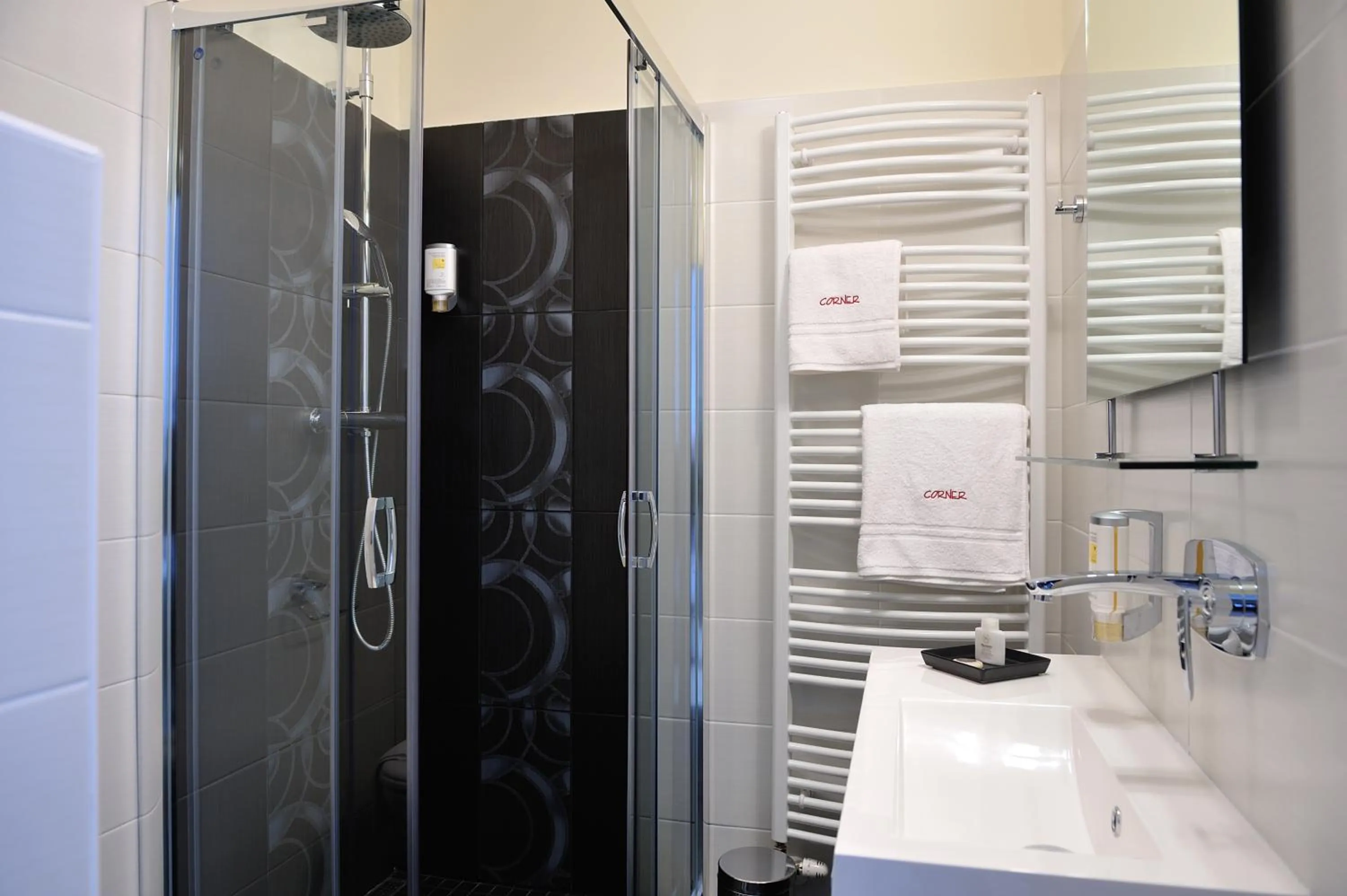 Bathroom in Corner Hotel & Kávéház