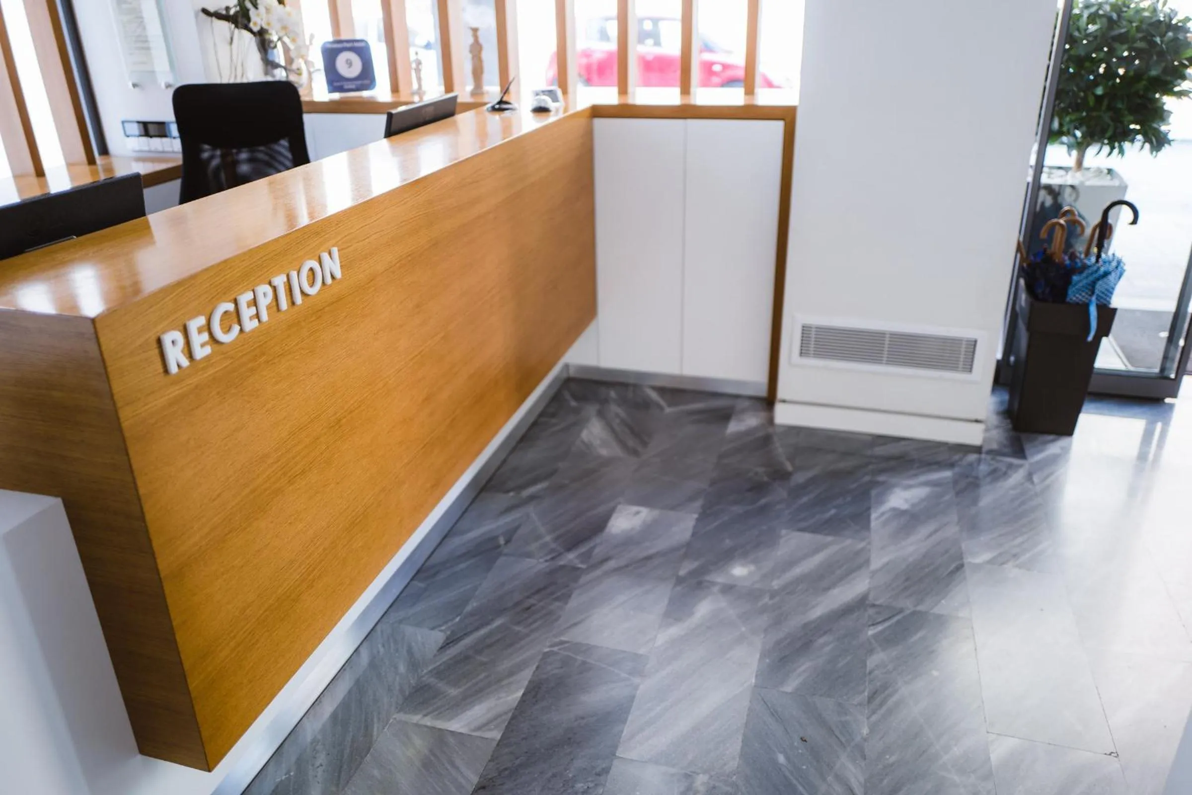 Lobby or reception in Piraeus Port Hotel