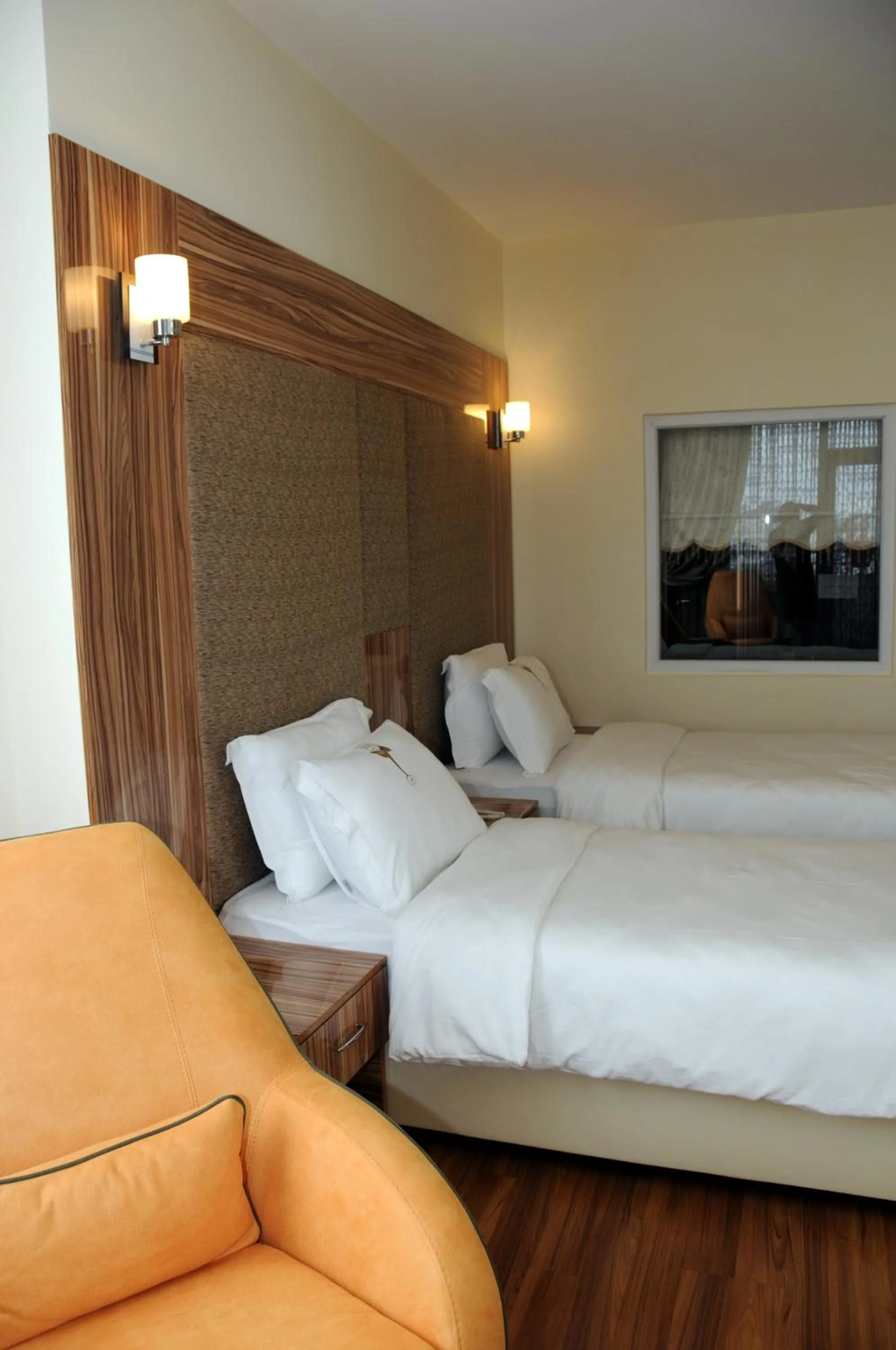 Seating area, Bed in Tehran Boutique Hotel