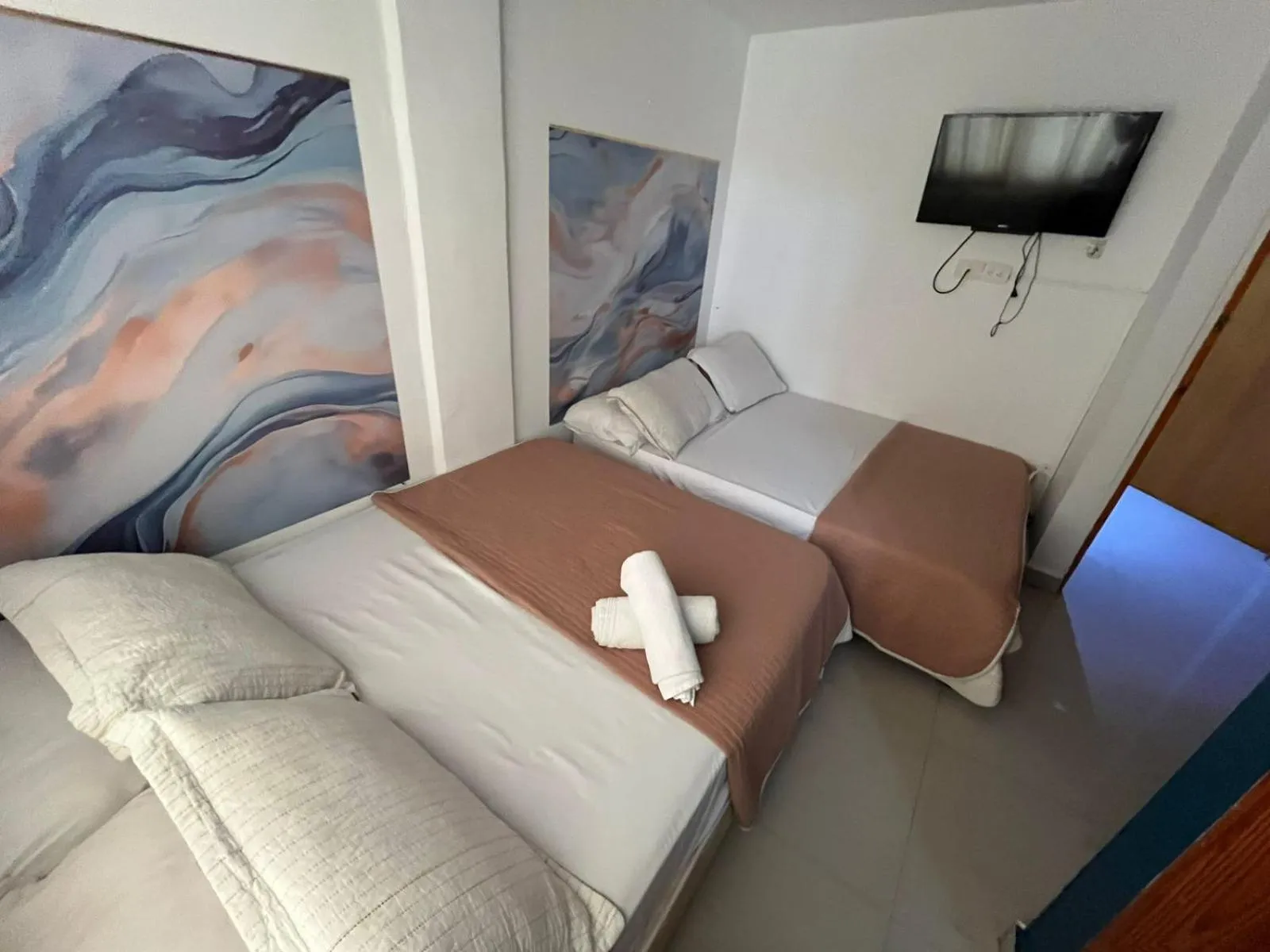 Bed in Sweet Caribbean Airport Hotel