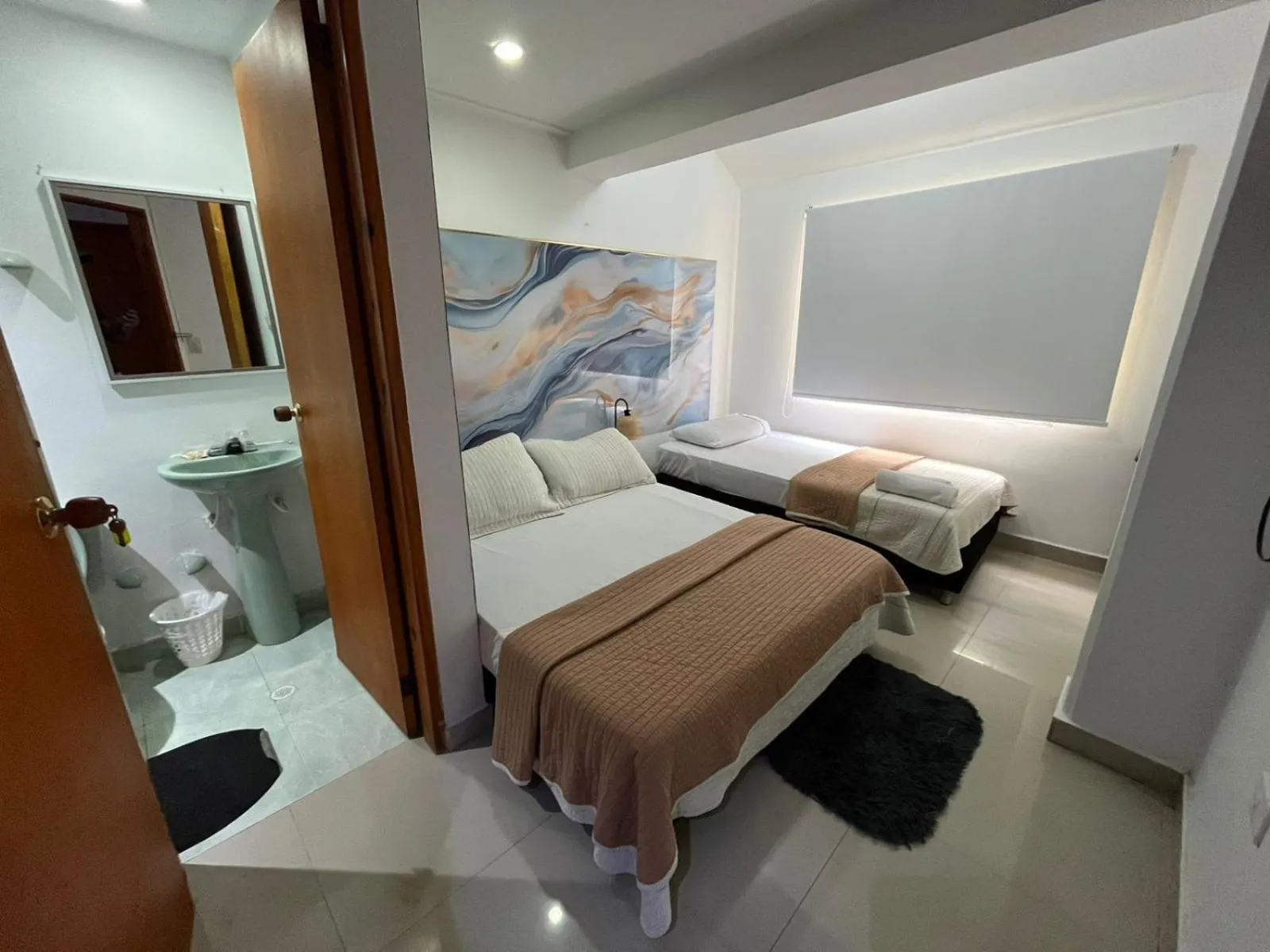 Bed in Sweet Caribbean Airport Hotel