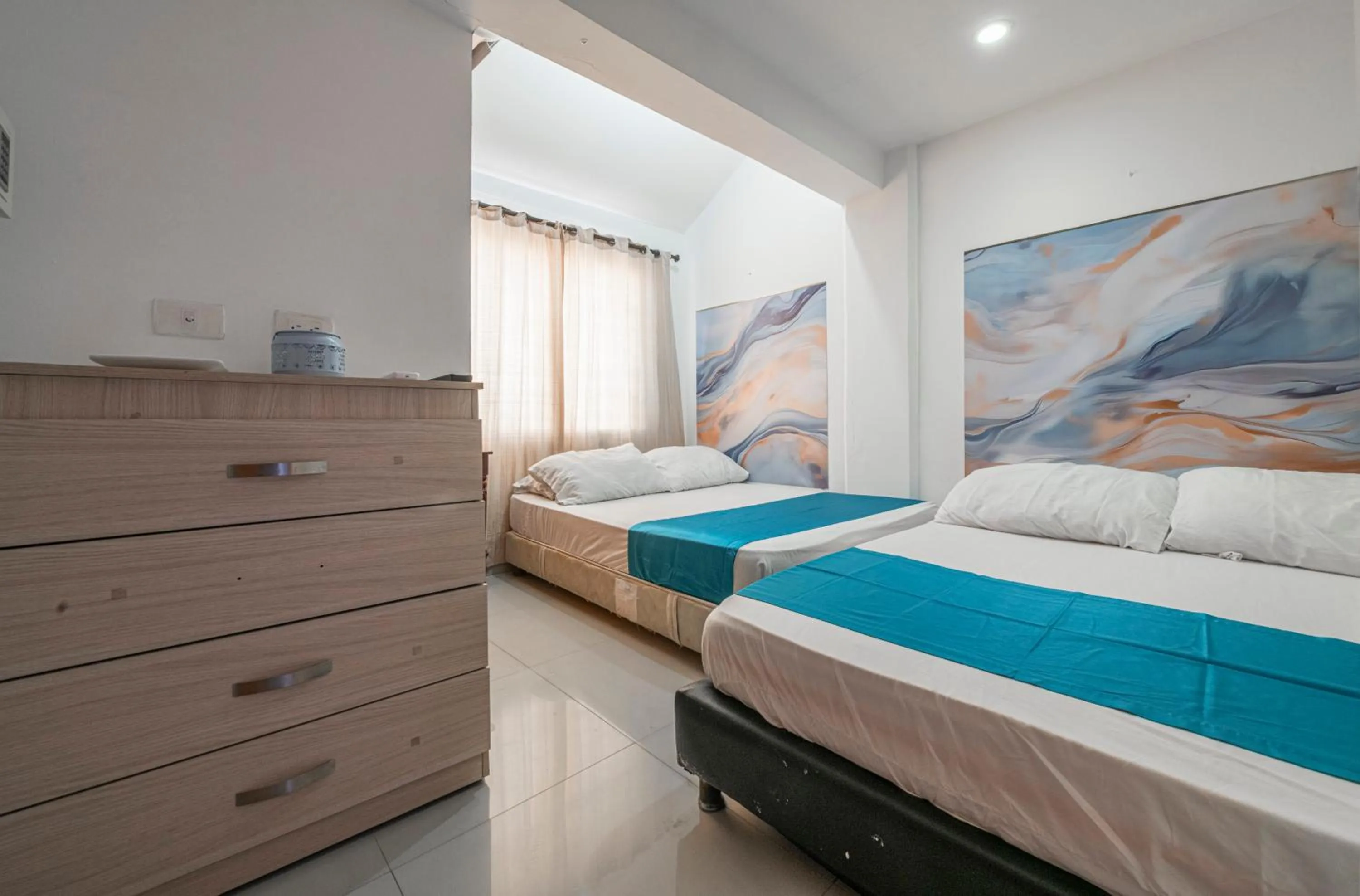 Bed in Sweet Caribbean Airport Hotel