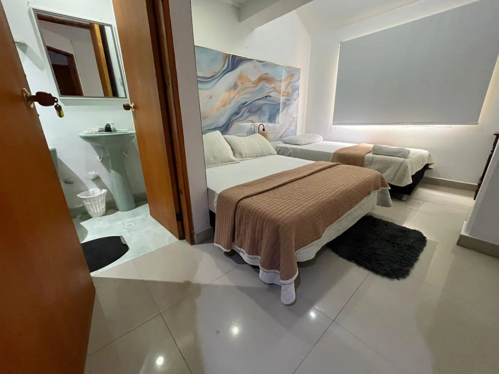 Bed in Sweet Caribbean Airport Hotel