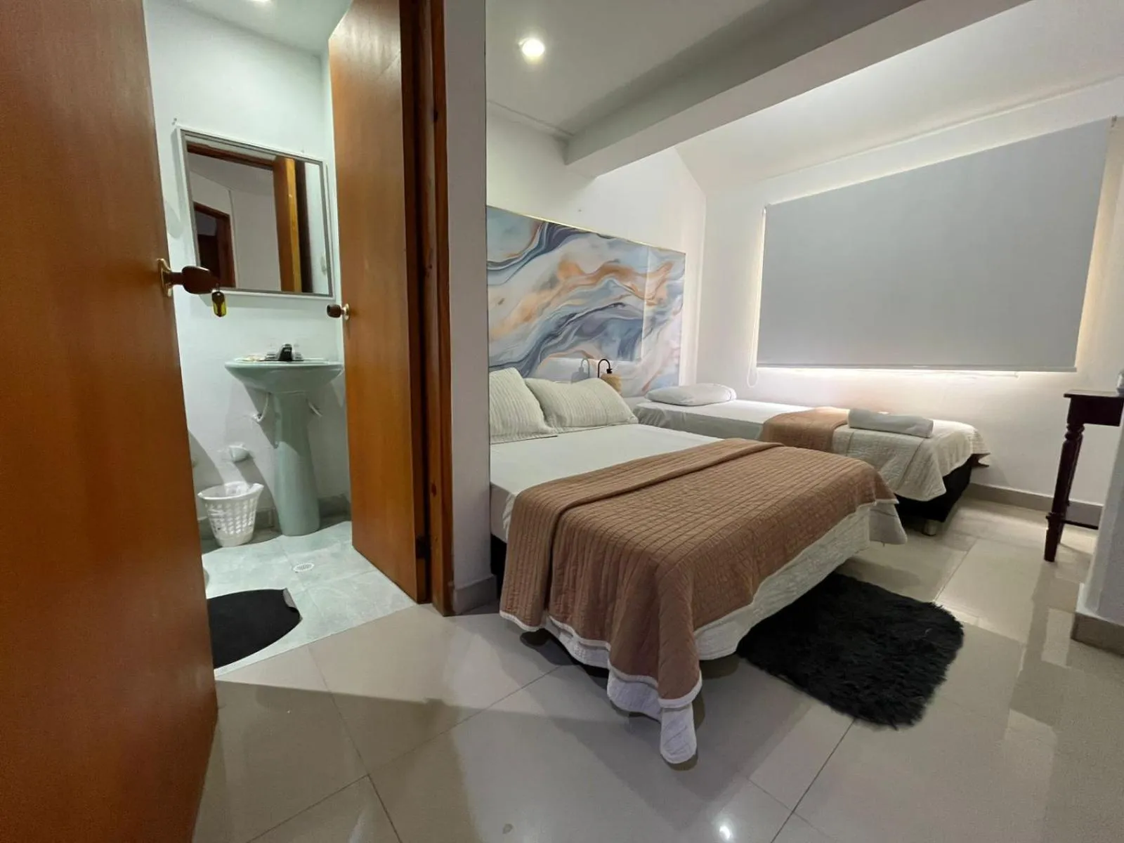 Bed in Sweet Caribbean Airport Hotel