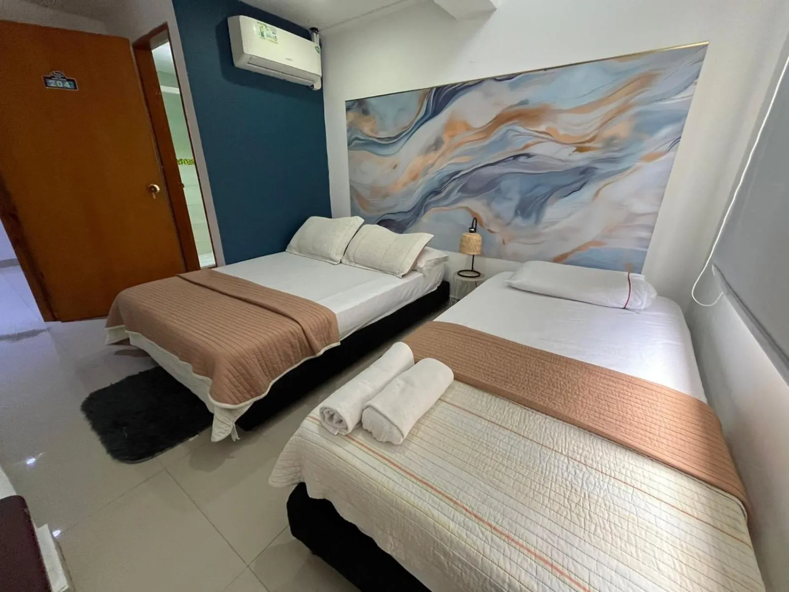 Bed in Sweet Caribbean Airport Hotel