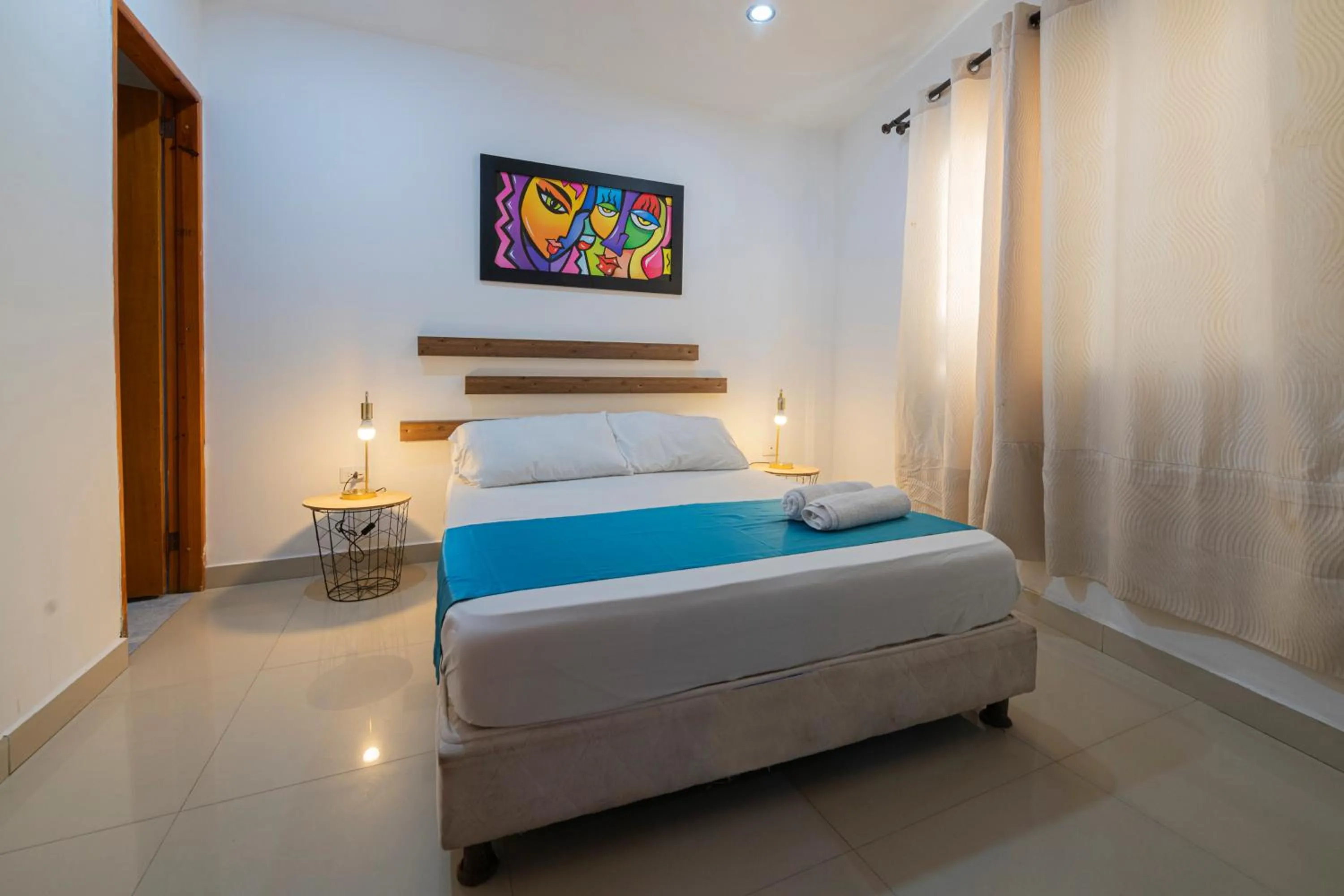 Bed in Sweet Caribbean Airport Hotel