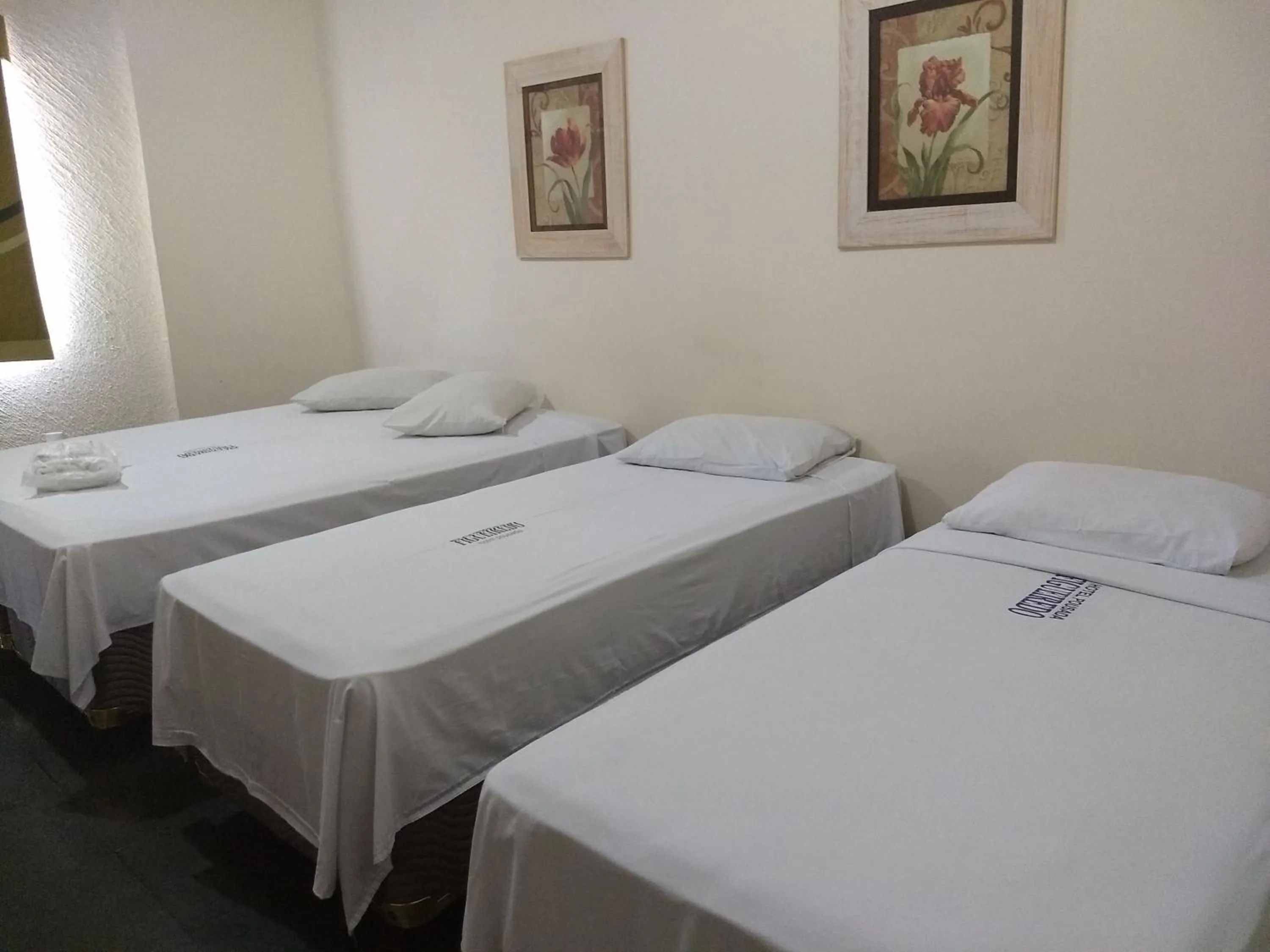 Bed in Hotel Pousada Figueiredo