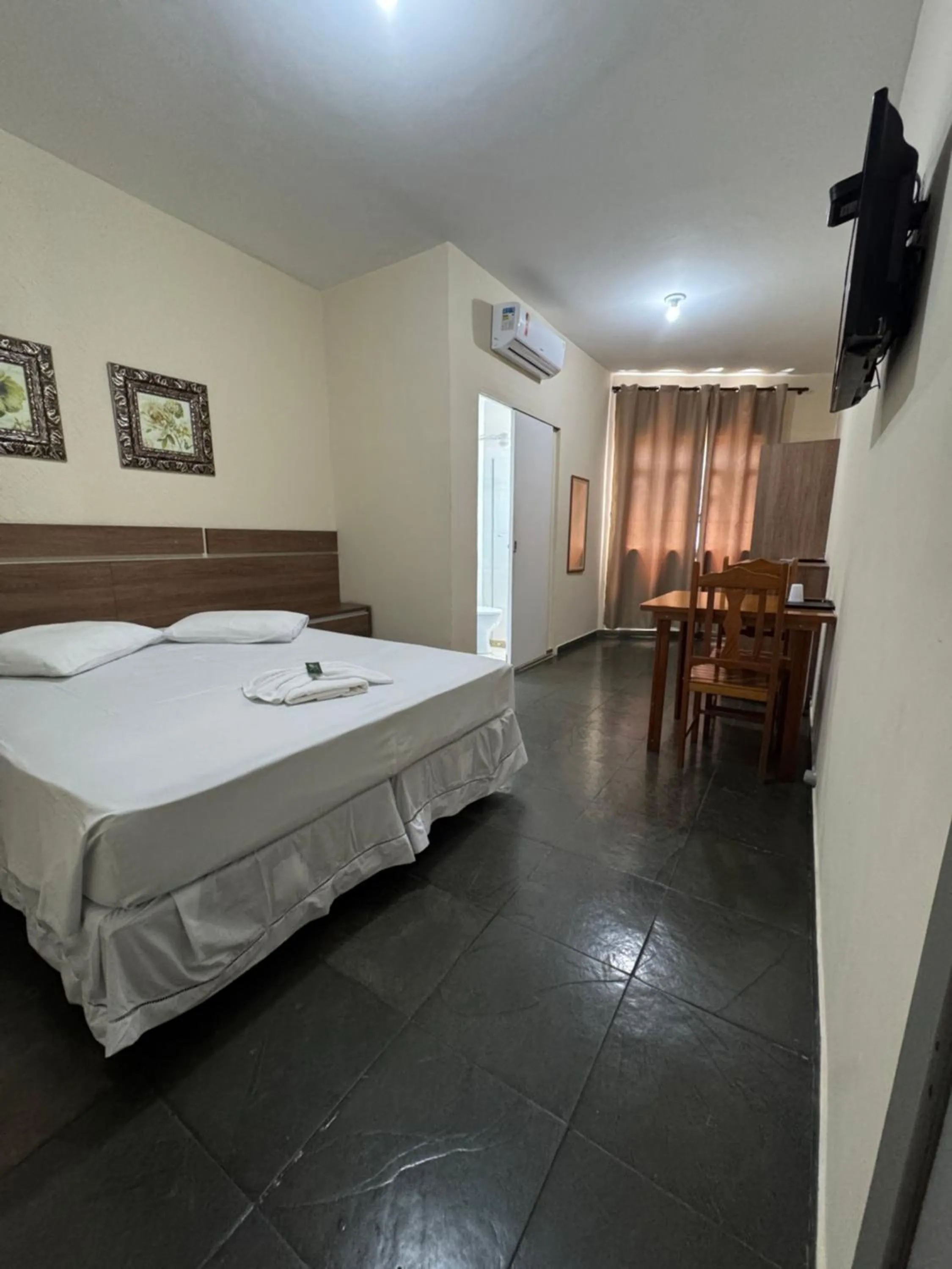 Bed in Hotel Pousada Figueiredo