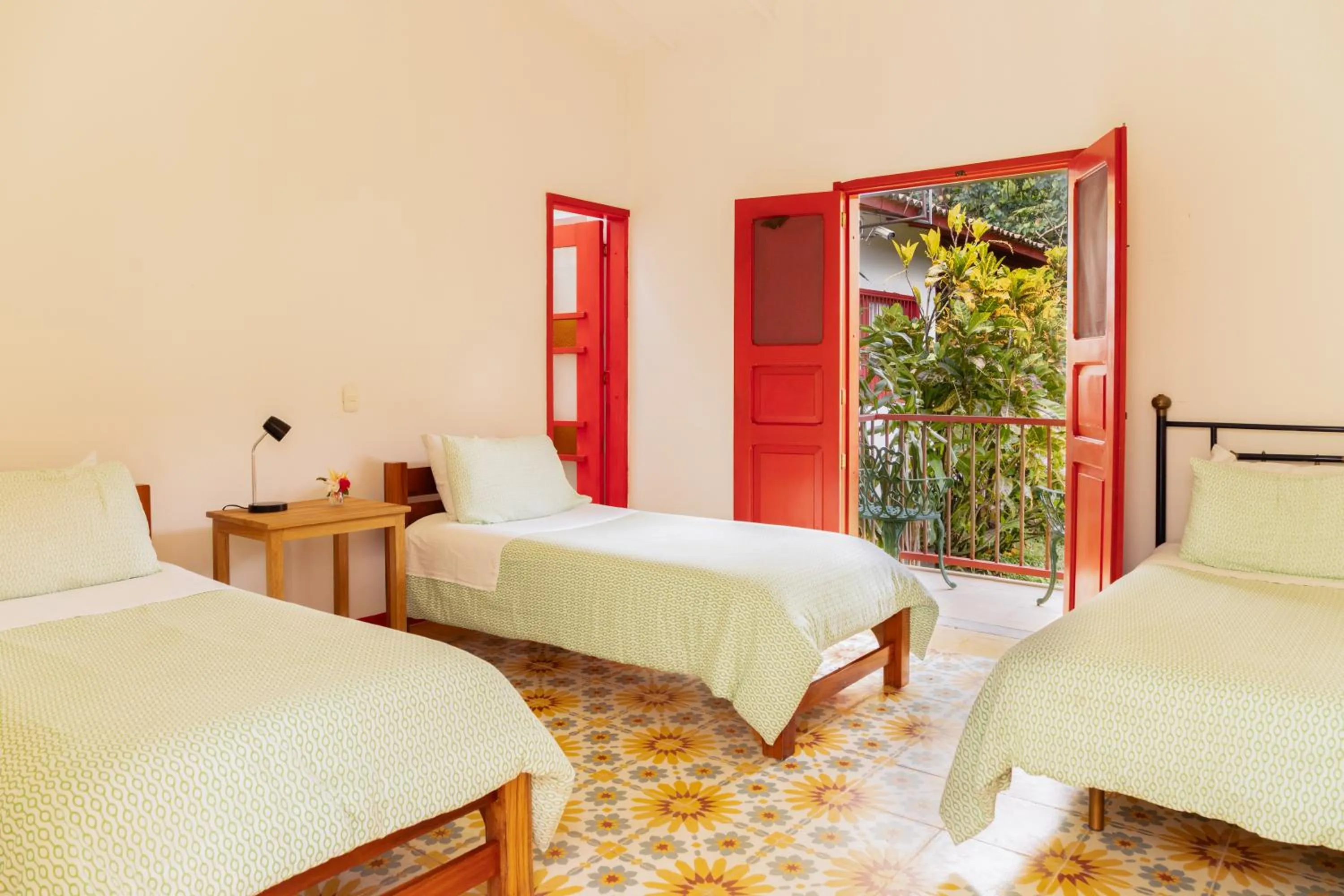 Bed in Hacienda Venecia Coffee Farm Hotel