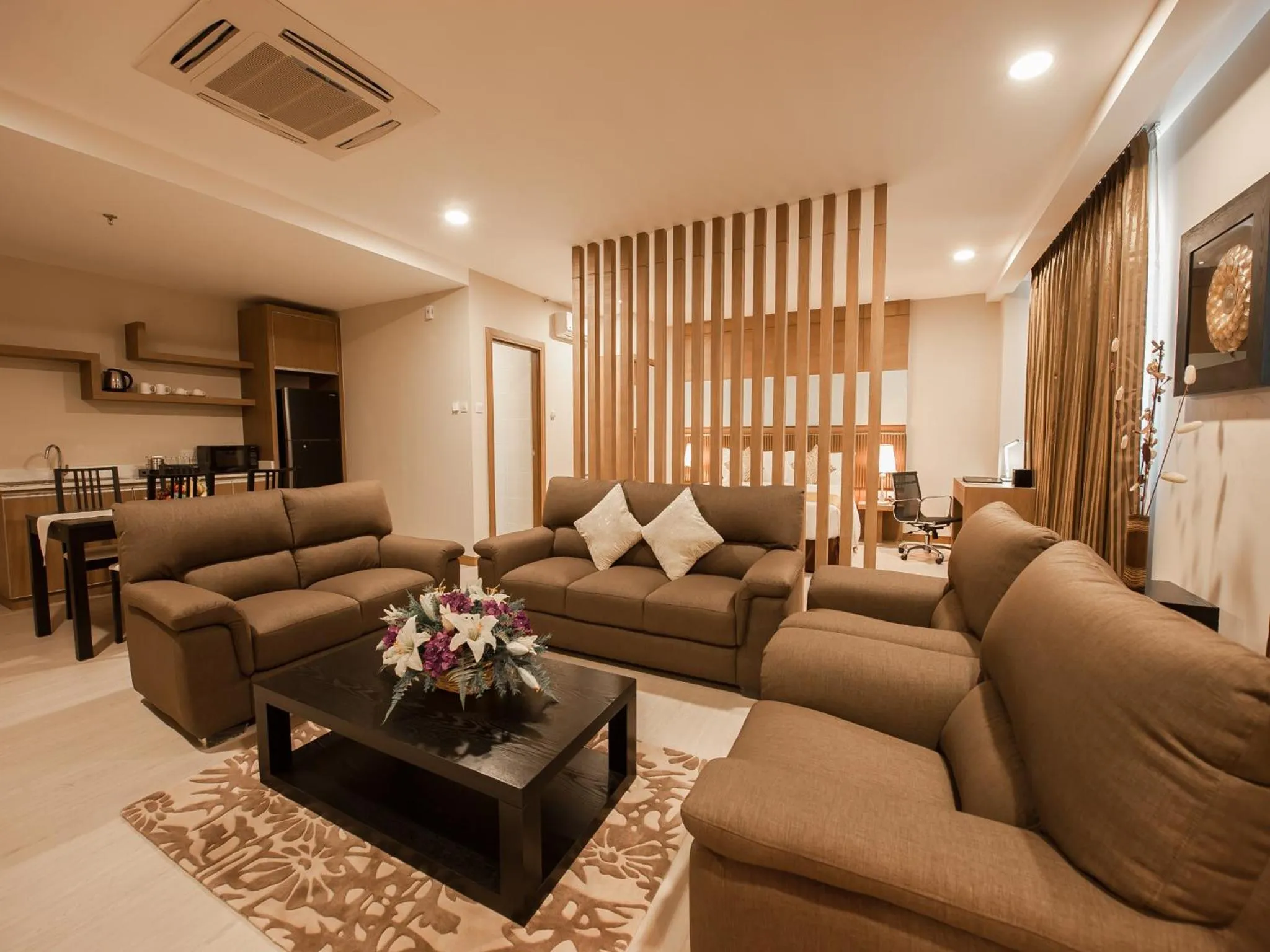 Communal lounge/ TV room in Garden Sentral Hotel