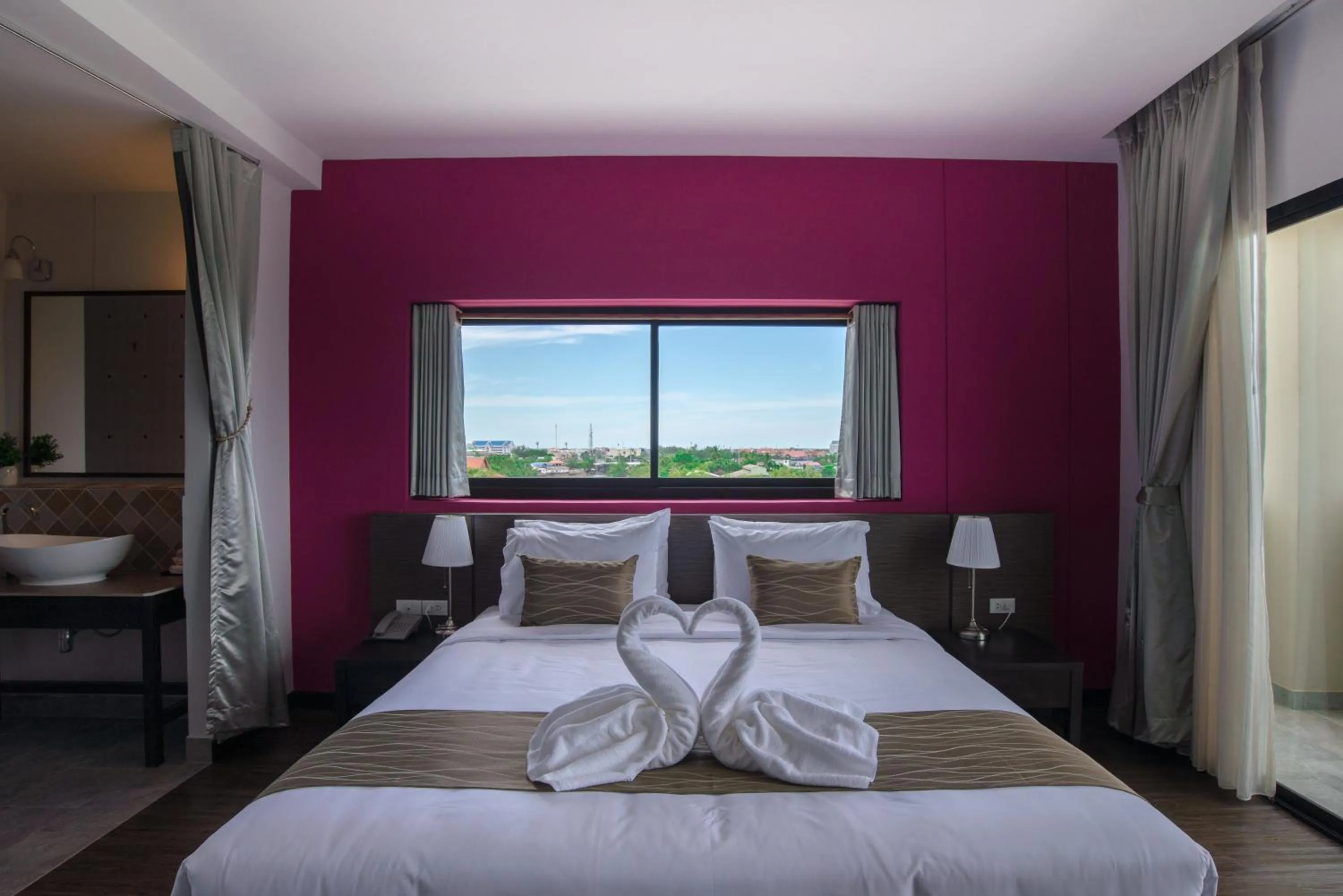 Bed in Coco View Hotel