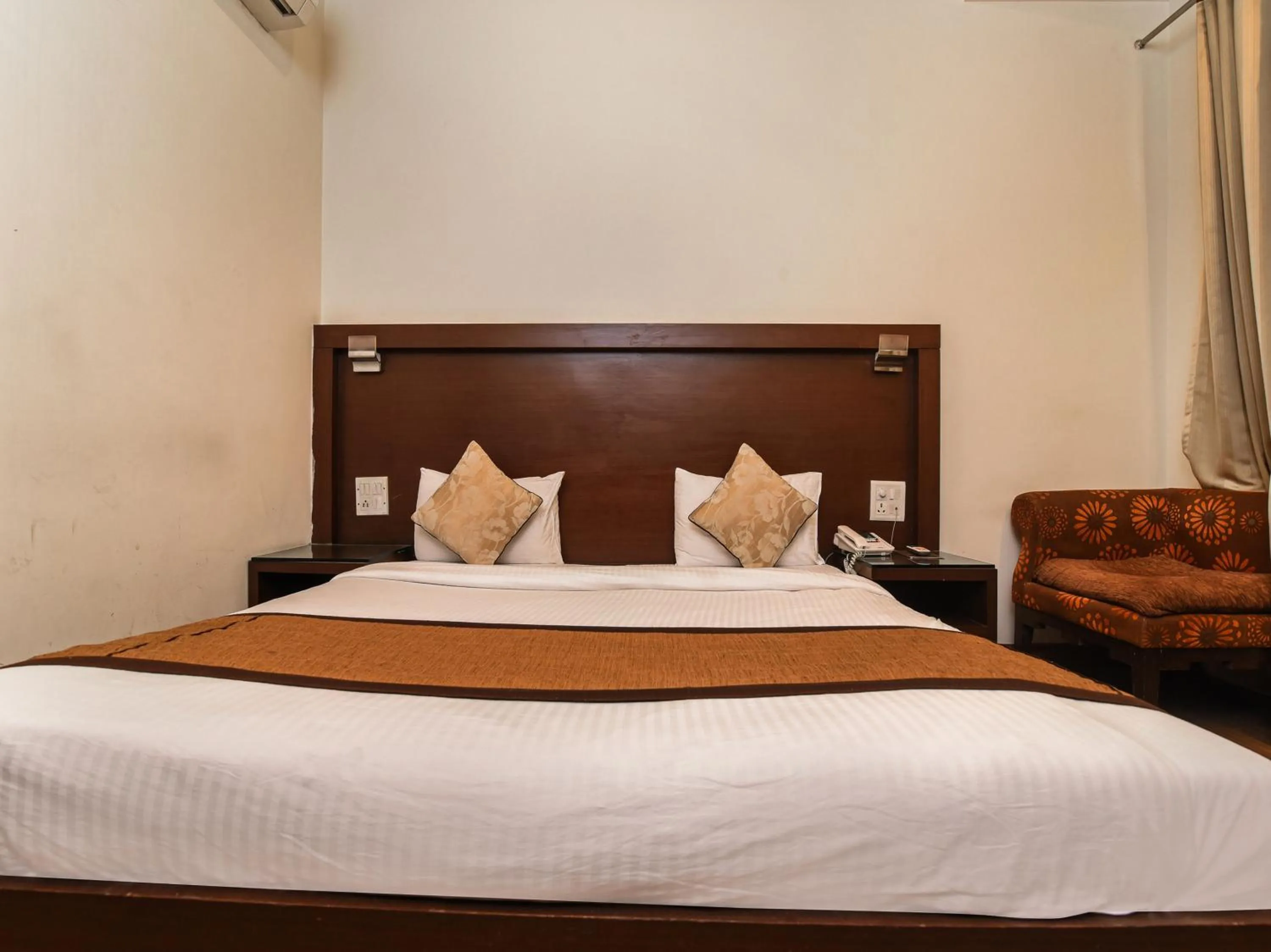 Bedroom, Bed in Hotel Haris MG Road Gurugram