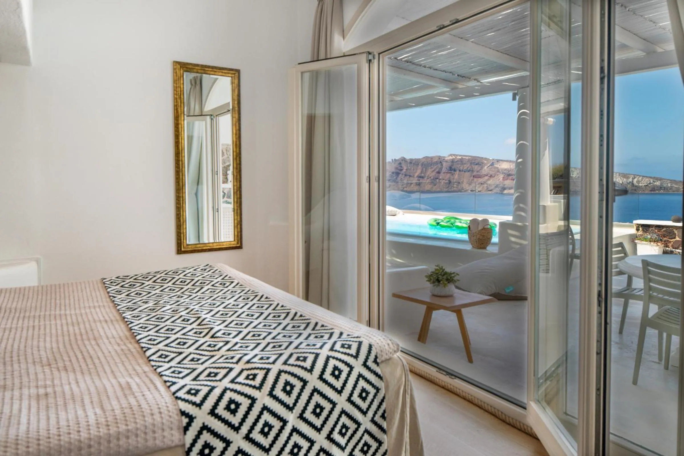 Bed in Ode Villa Oia Caldera & Sunset View