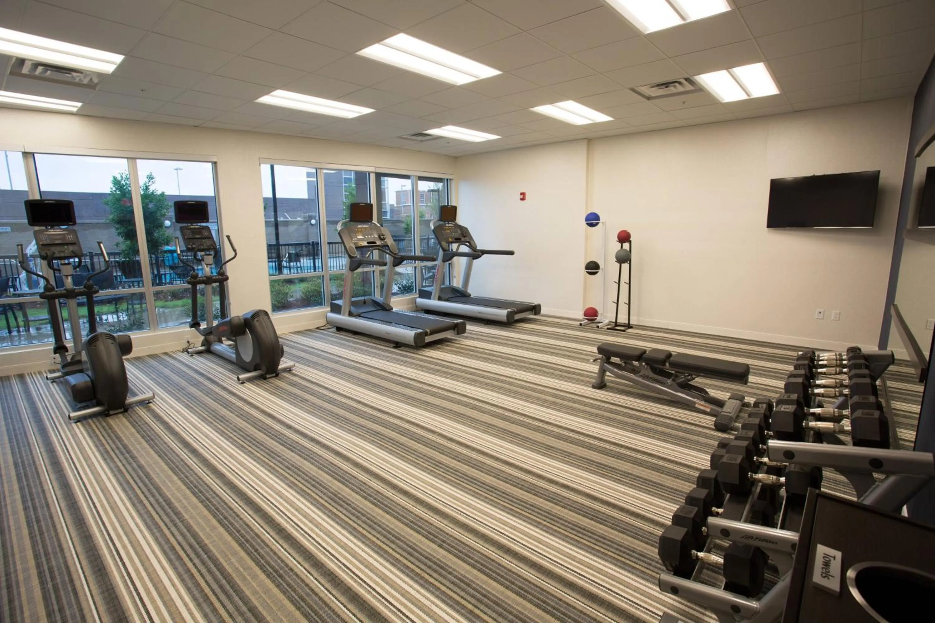 Fitness centre/facilities in Courtyard by Marriott Starkville MSU at The Mill Conference Center