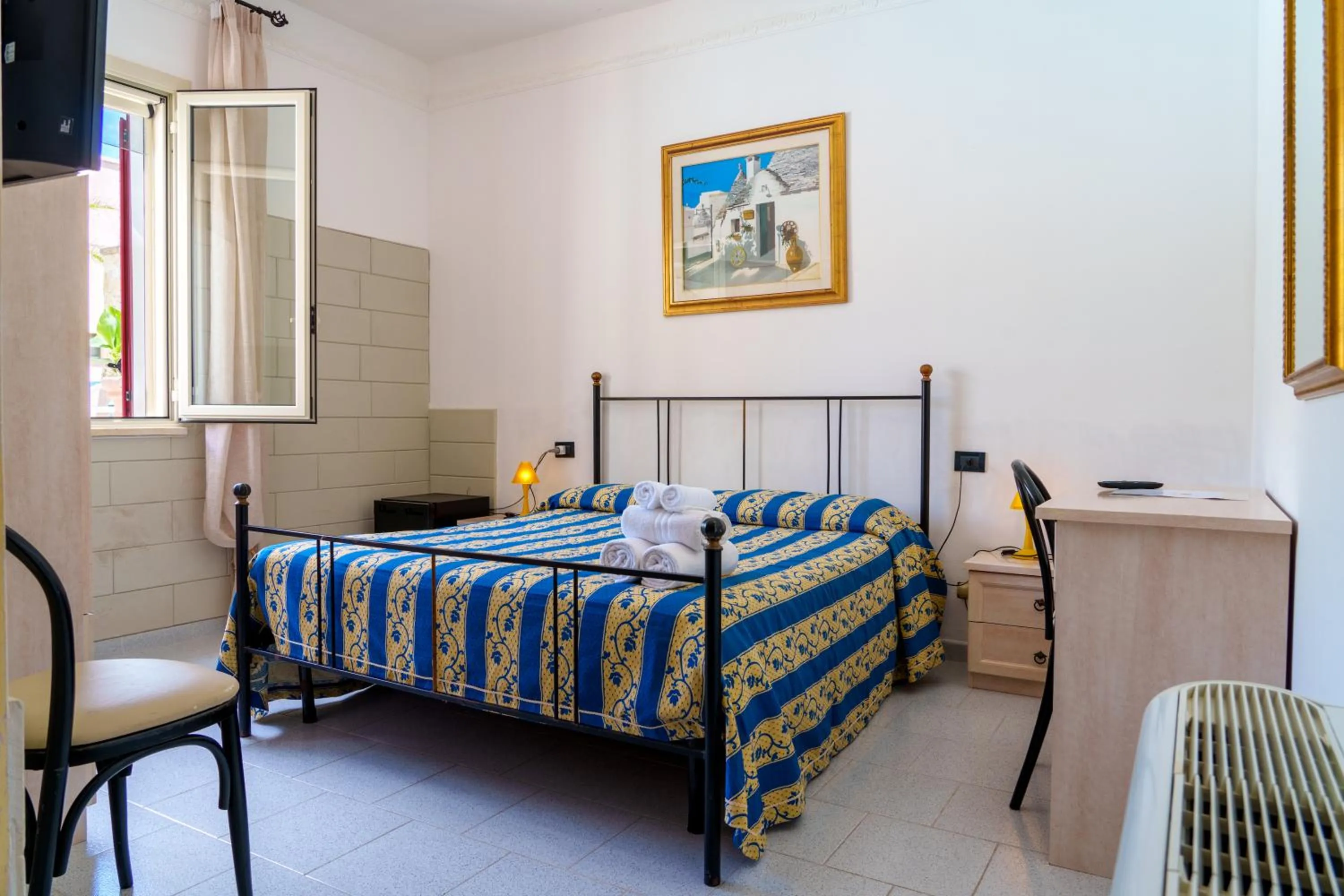 Bedroom in Hotel Le Macine