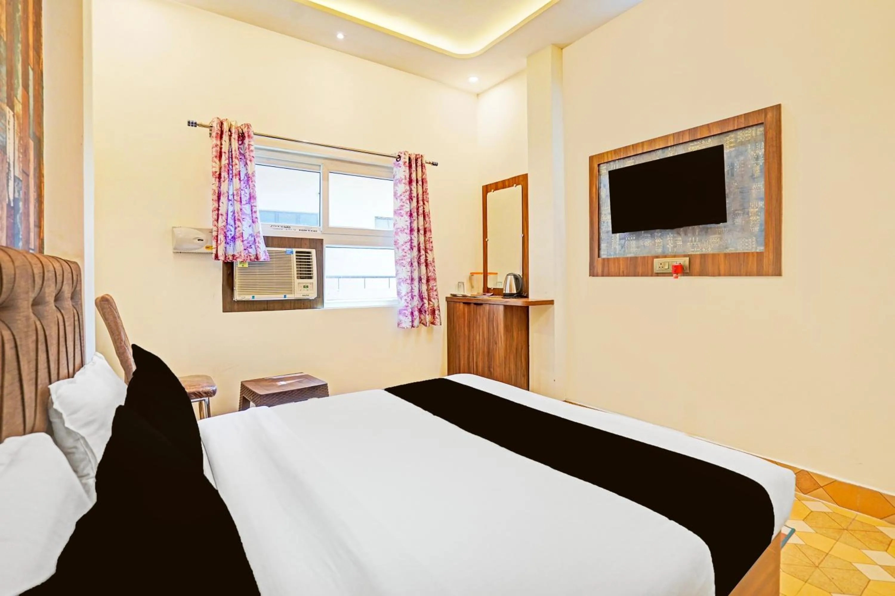 Bedroom in Hotel O MB Grand