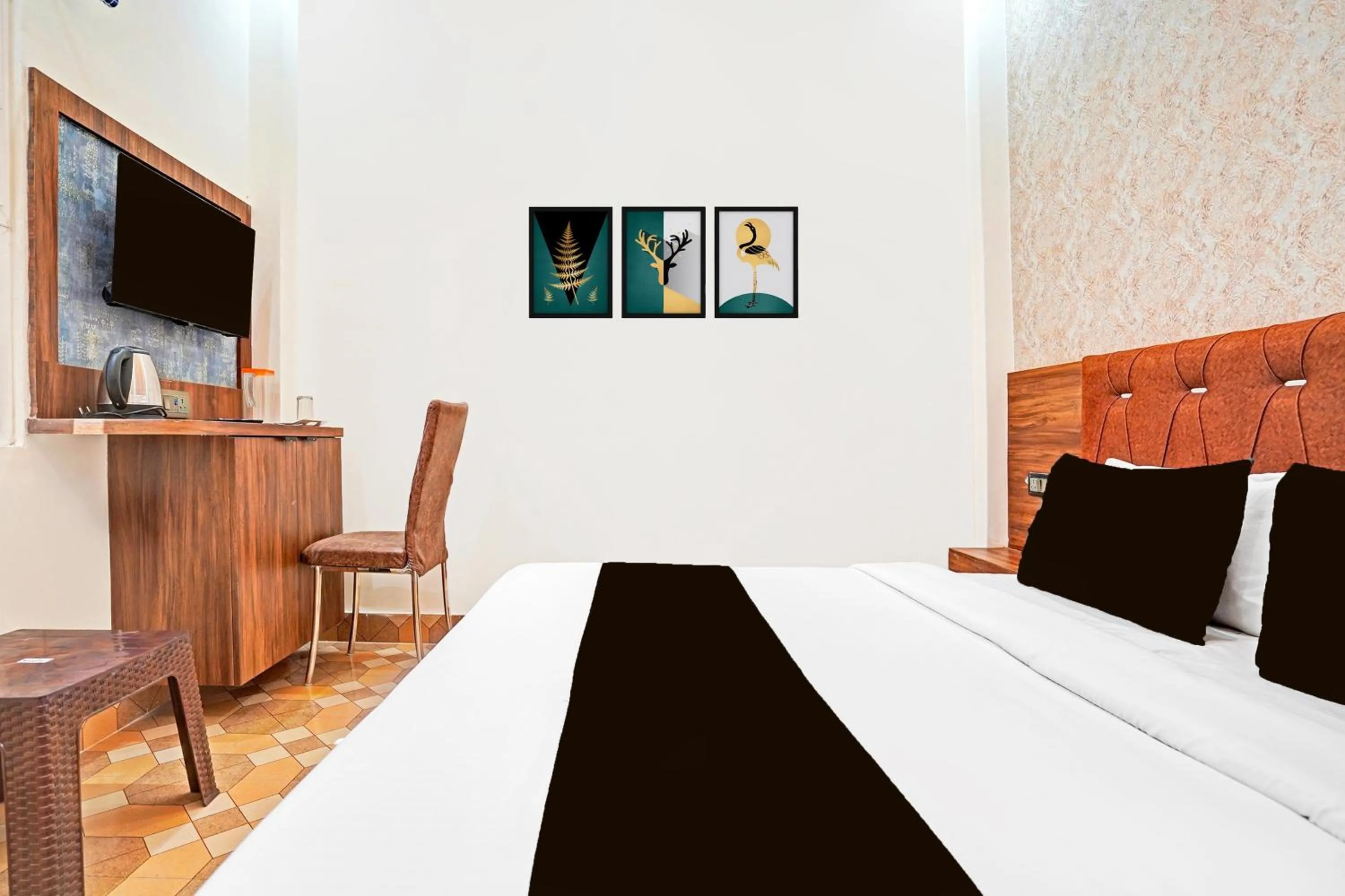 Bedroom in Hotel O MB Grand