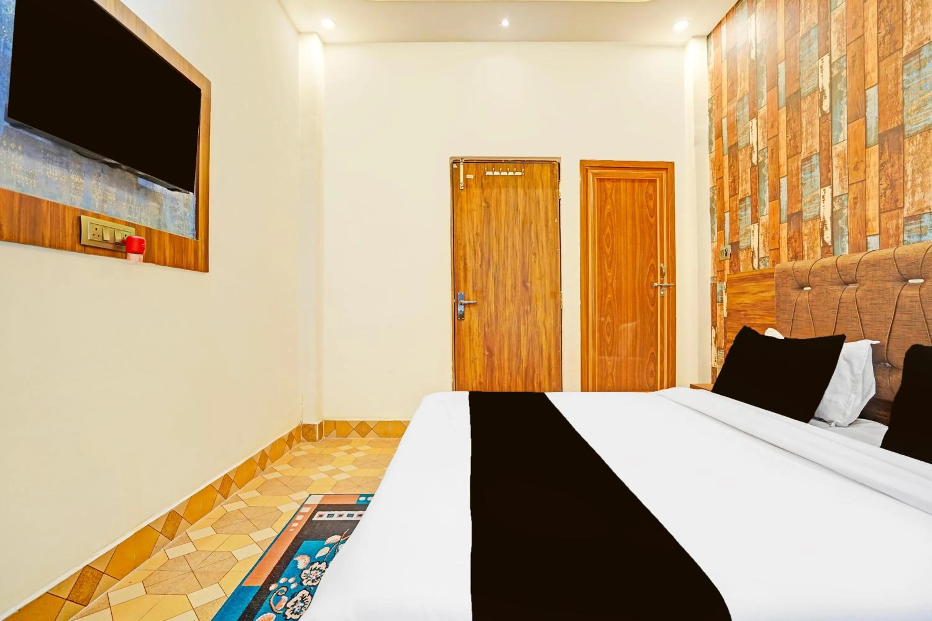 Bedroom in Hotel O MB Grand