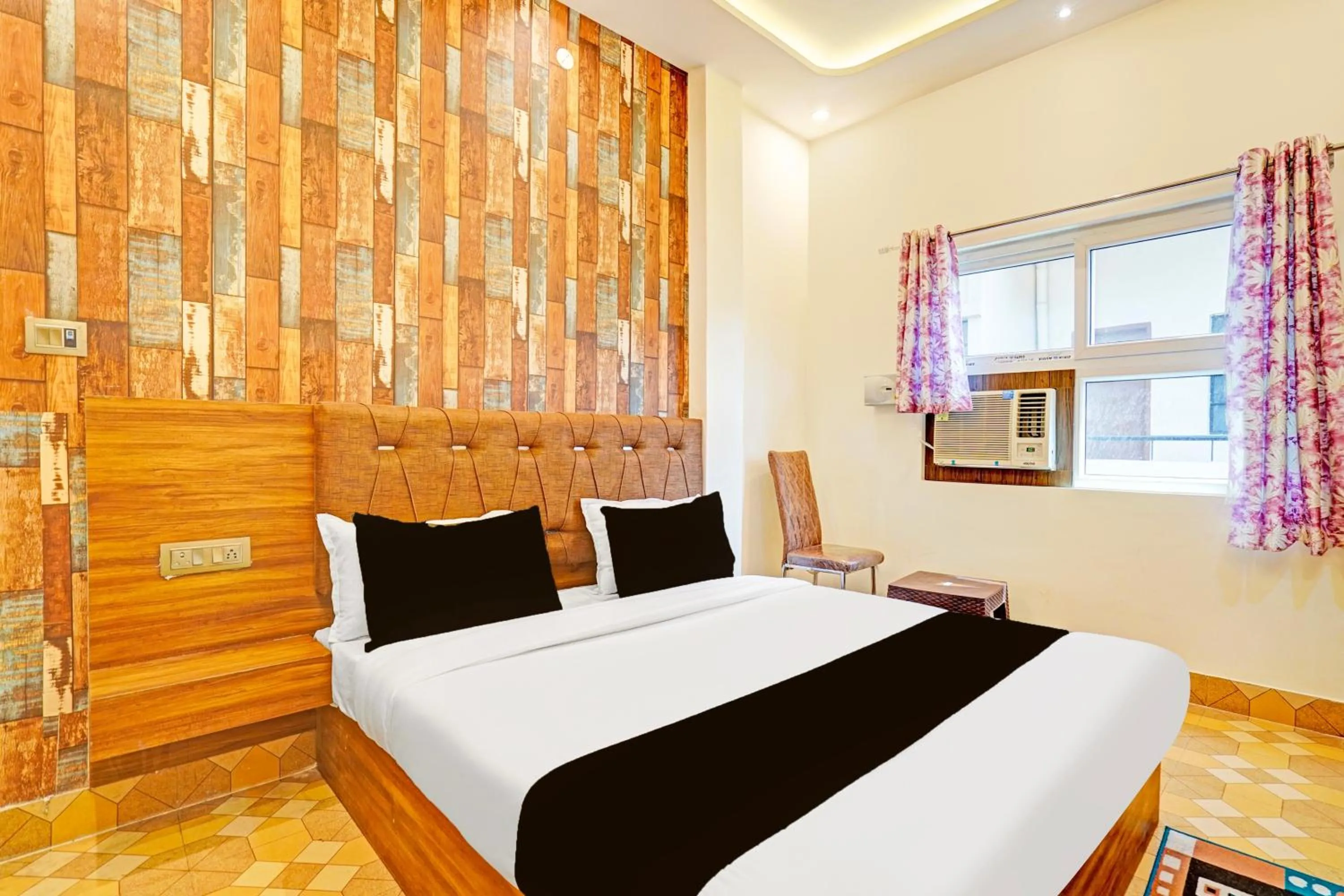 Bedroom in Hotel O MB Grand