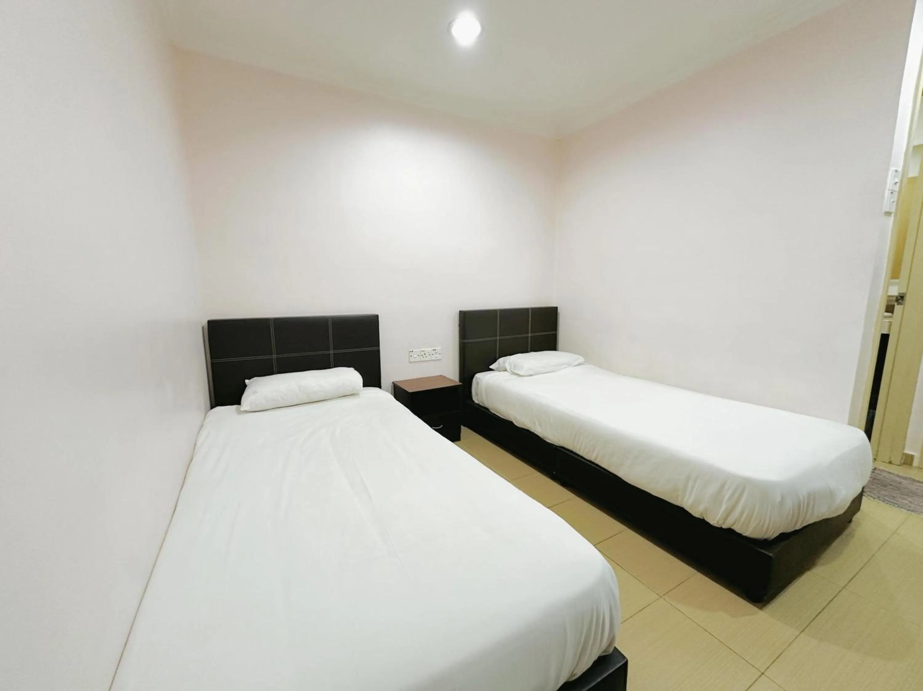Photo of the whole room, Bed in Hotel O Tasik Utama