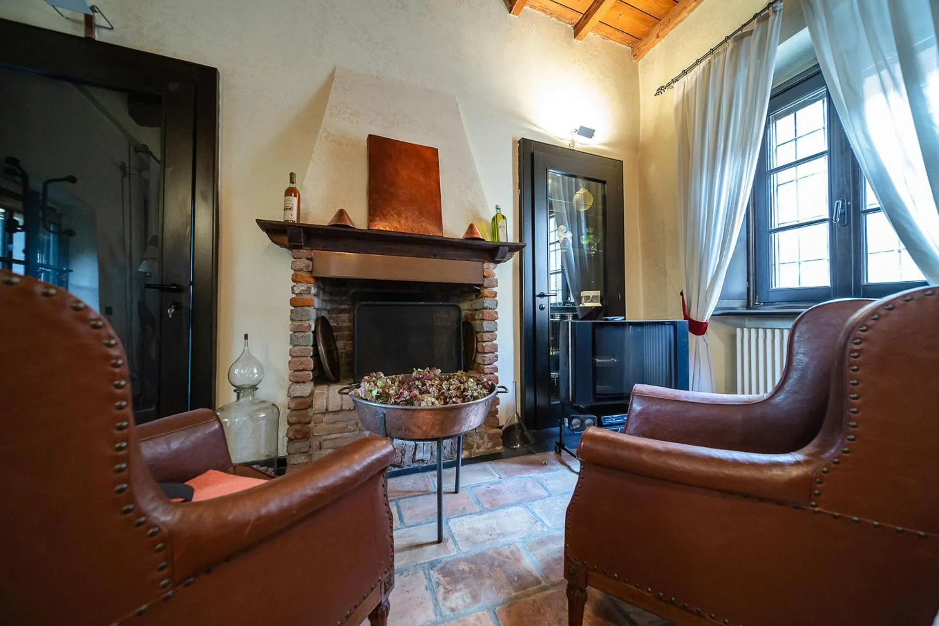 Communal lounge/ TV room in La Locanda di Sant'Anna