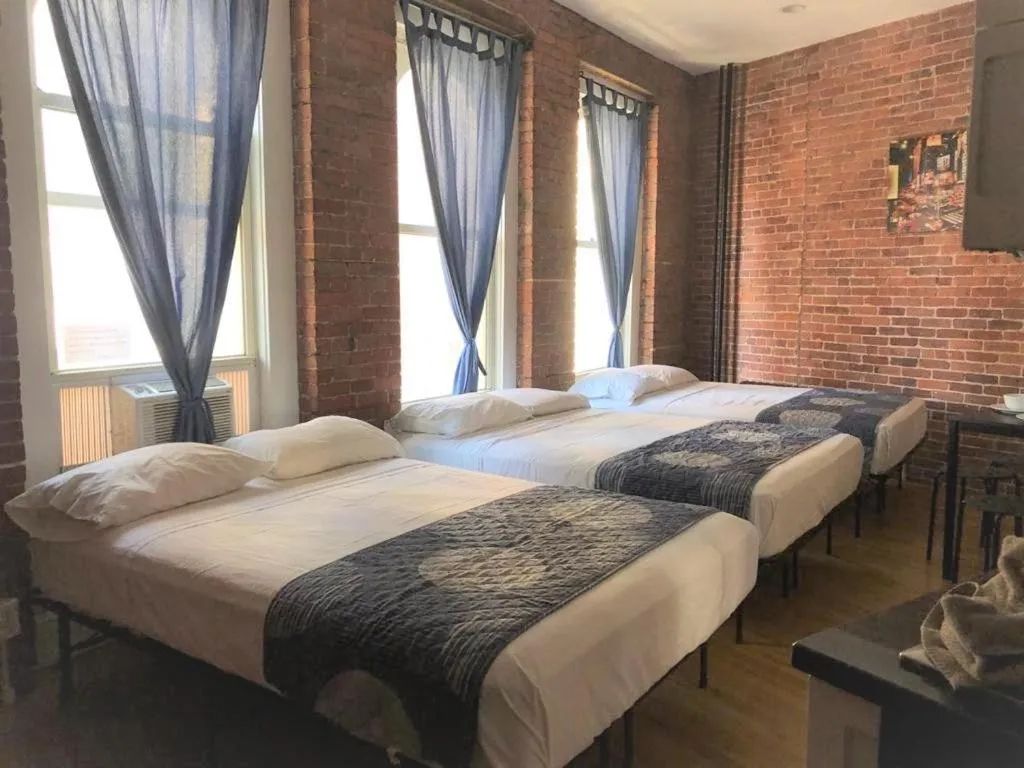 Bathroom, Bed in Studios Midtown Manhattan