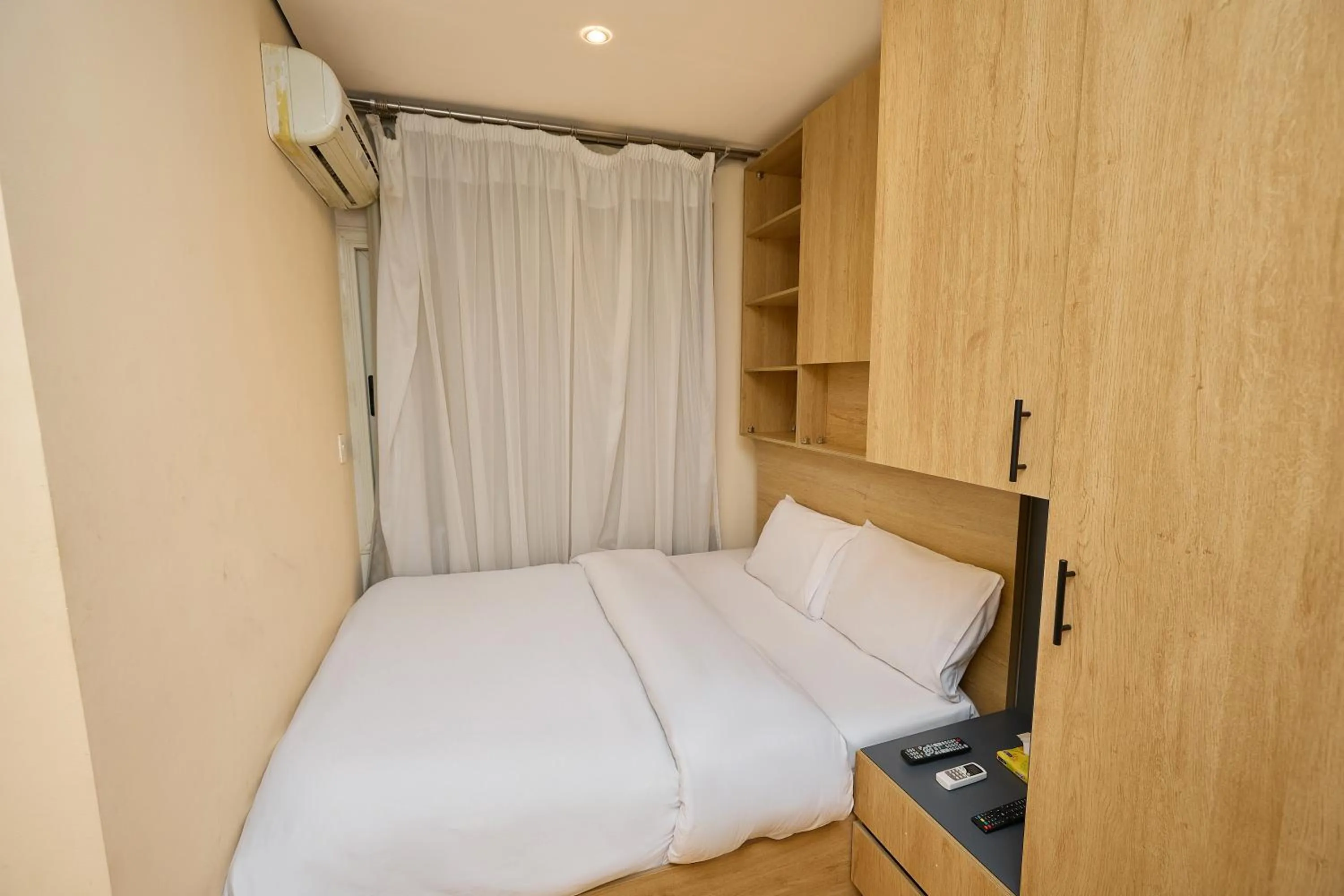 Bed in Settle Inn Al Rehab City A