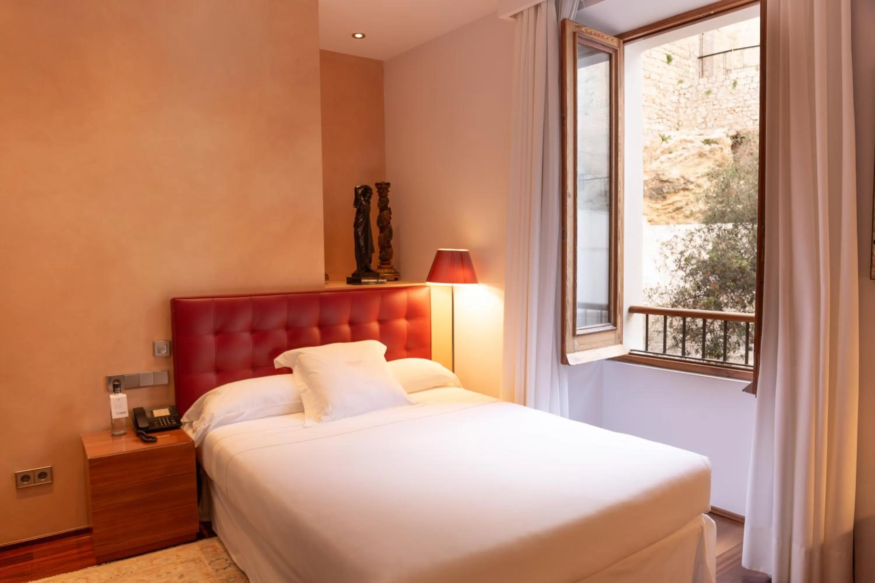 Bed in Mirador de Dalt Vila-Relais & Chateaux