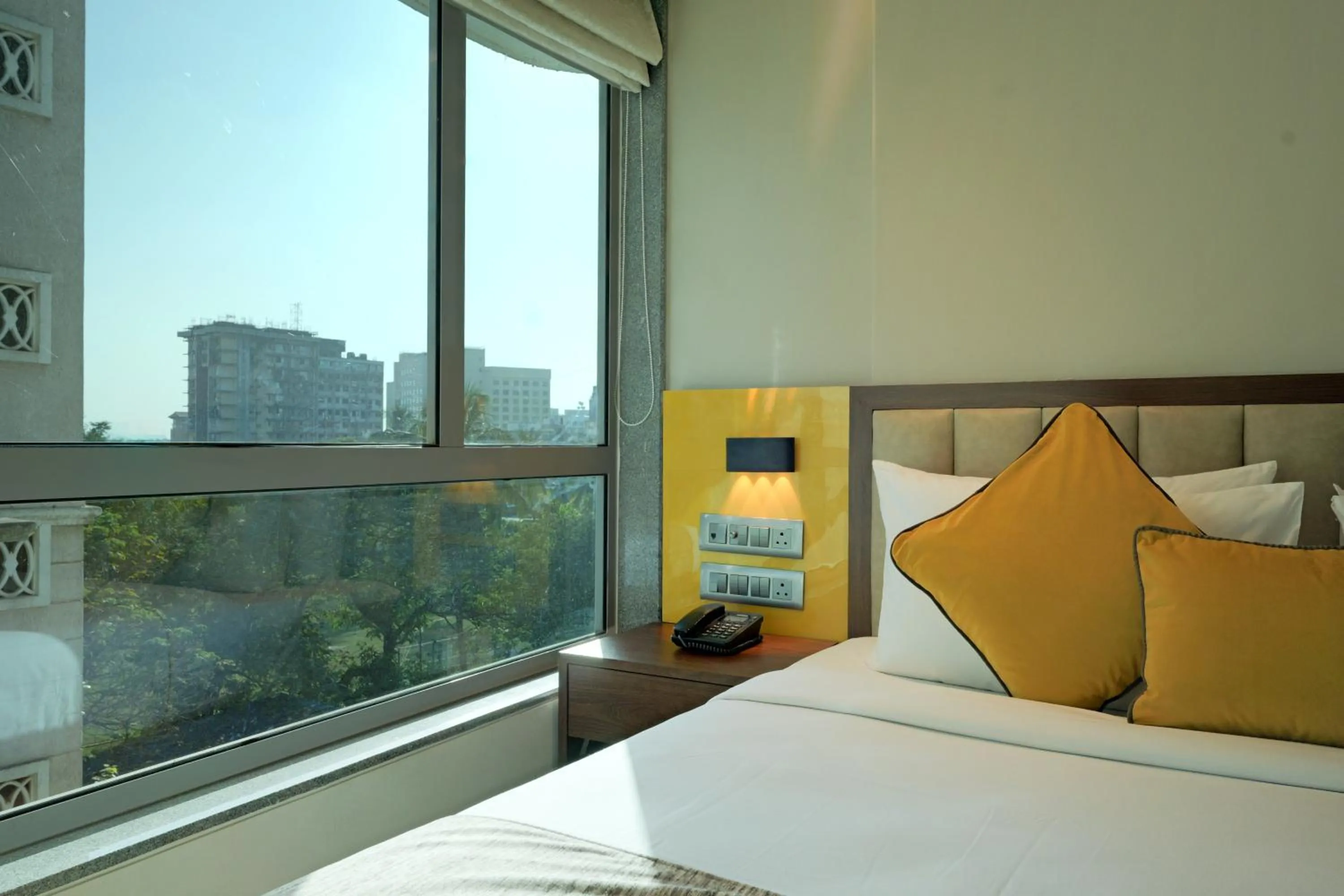 View (from property/room), Bed in Hotel Flexi Residency Mumbai International Airport