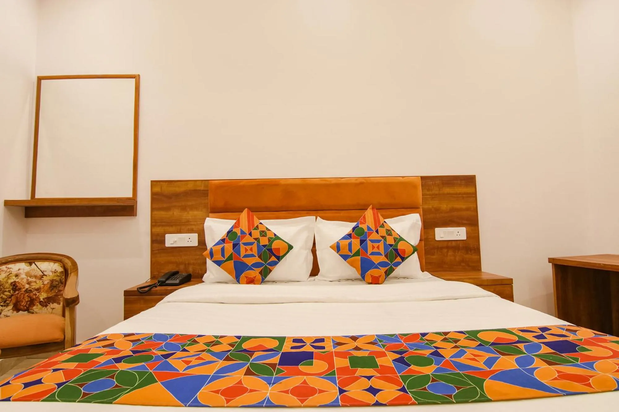 Bed in FabHotel Ambassador