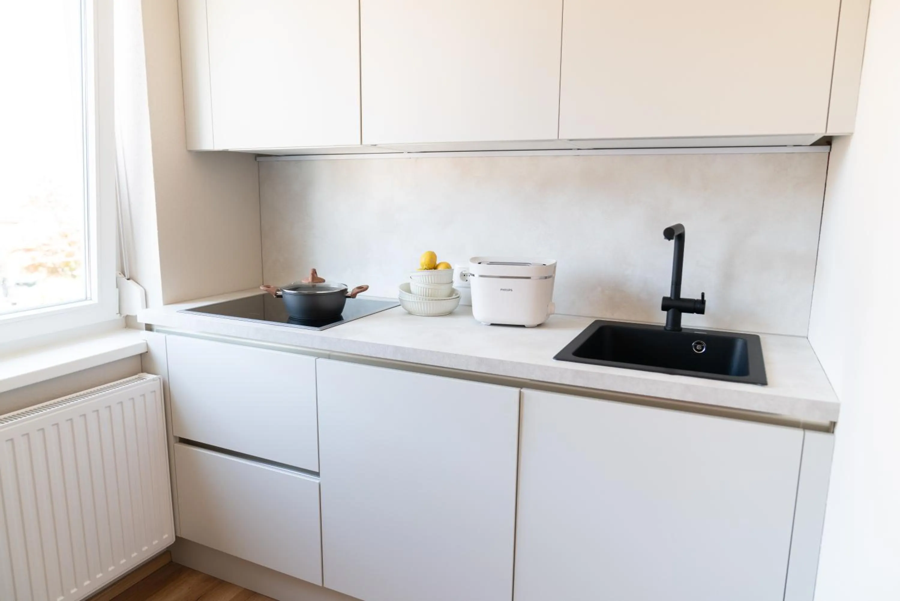 Kitchen or kitchenette in Velotique Hotel Angelika - Self-Check-in