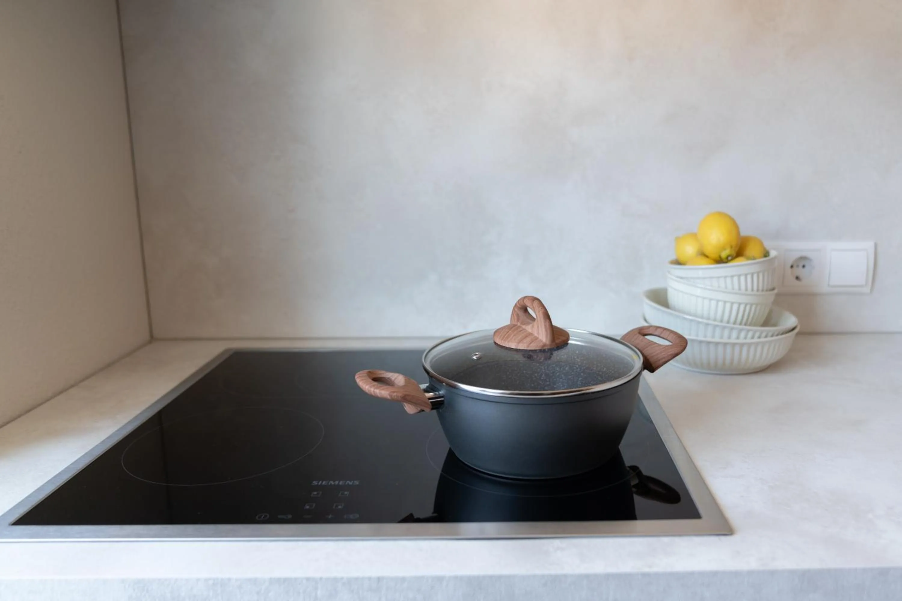 Kitchen or kitchenette in Velotique Hotel Angelika - Self-Check-in