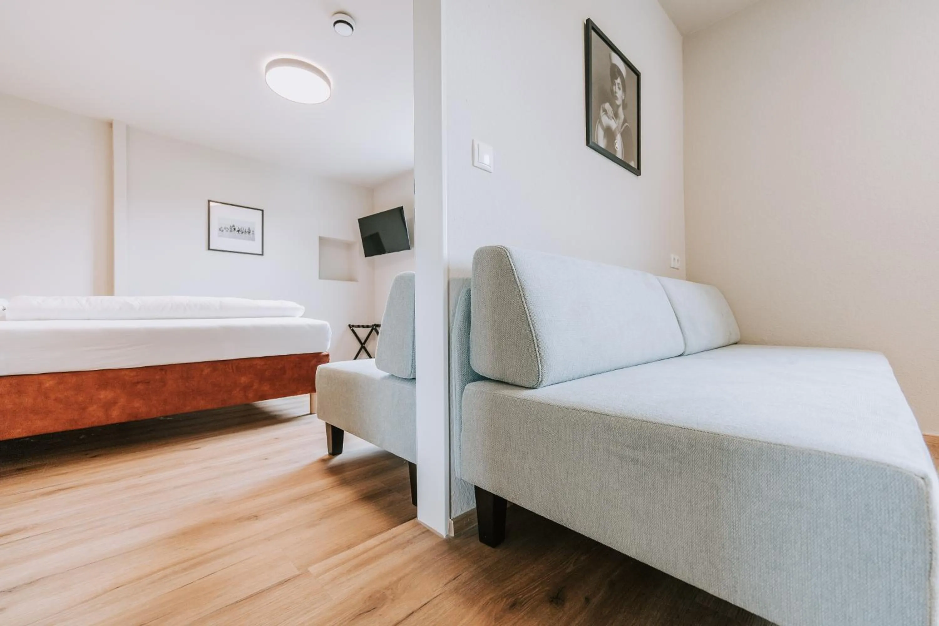 Bed in Velotique Hotel Angelika - Self-Check-in