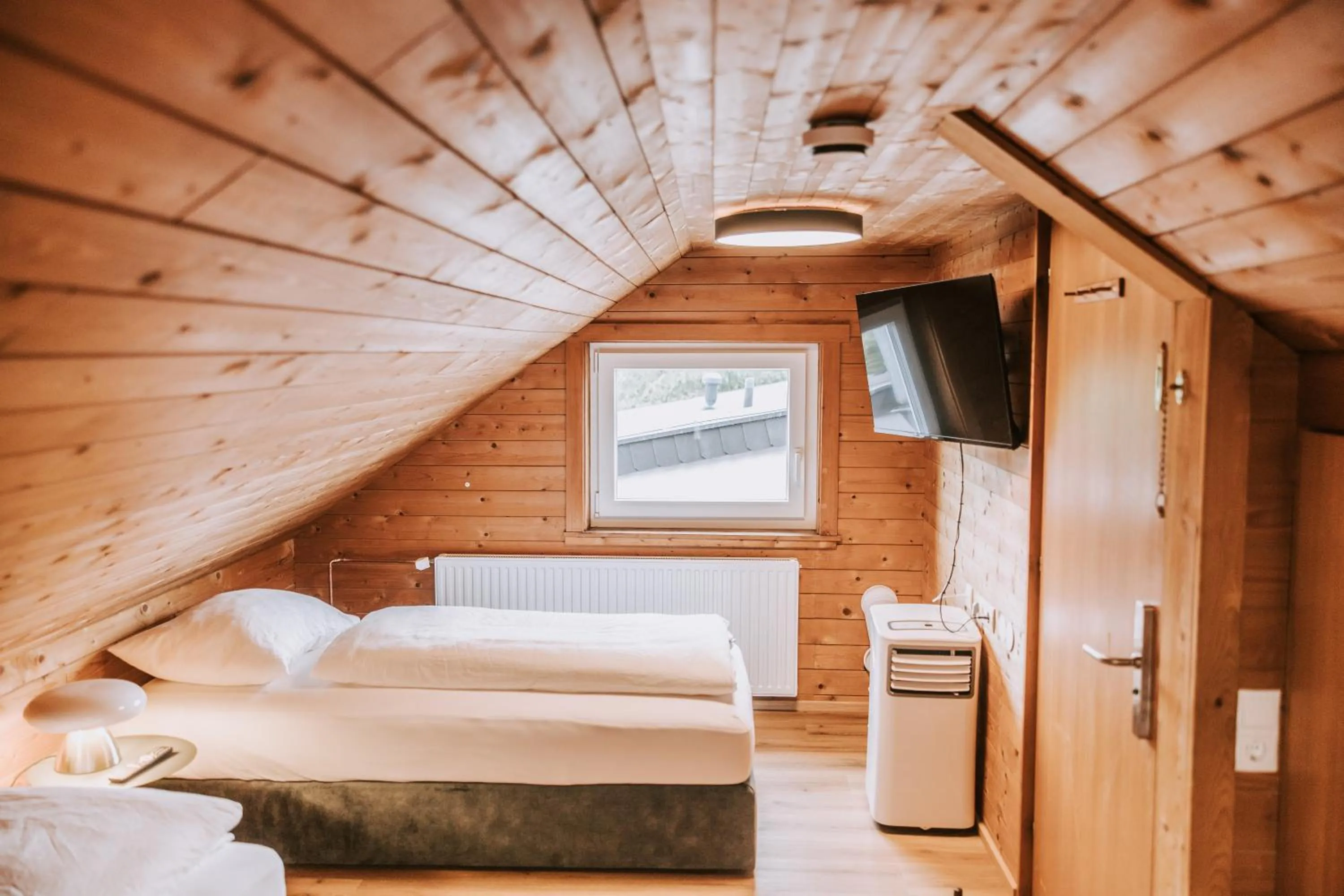 Bed in Velotique Hotel Angelika - Self-Check-in