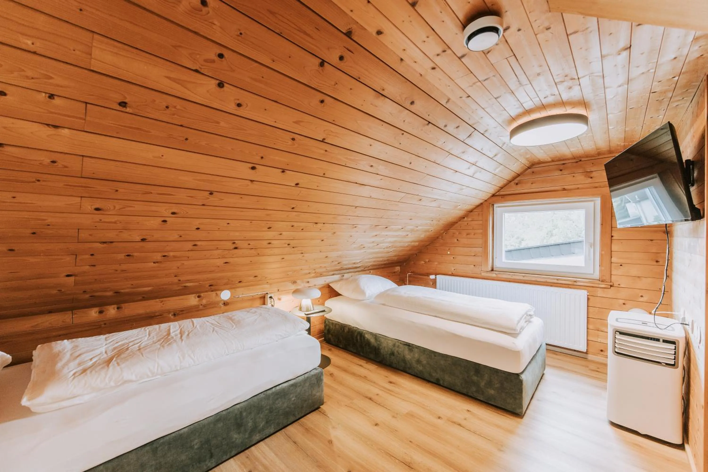 Bed in Velotique Hotel Angelika - Self-Check-in