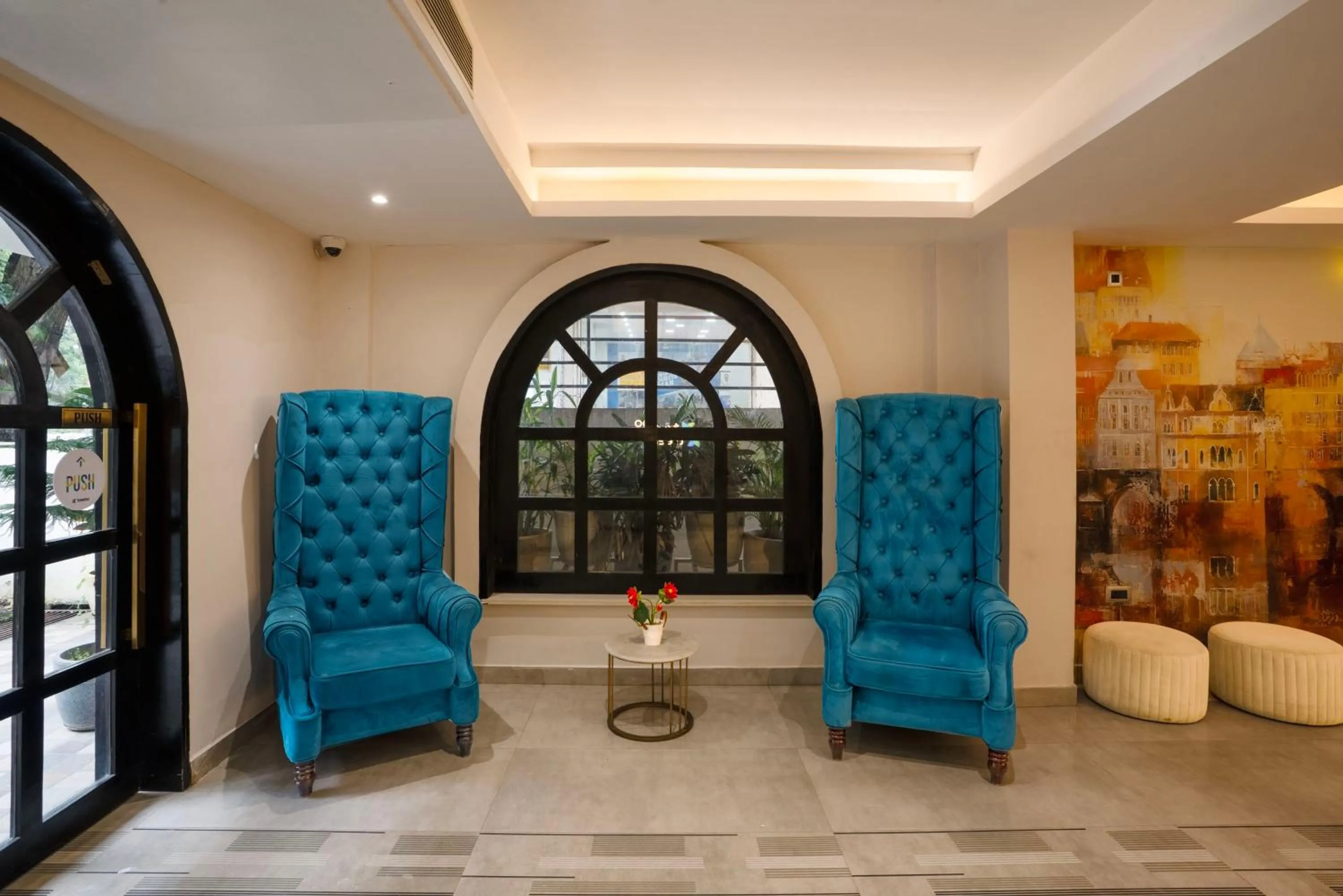 Seating area in Treebo Golden Leaf