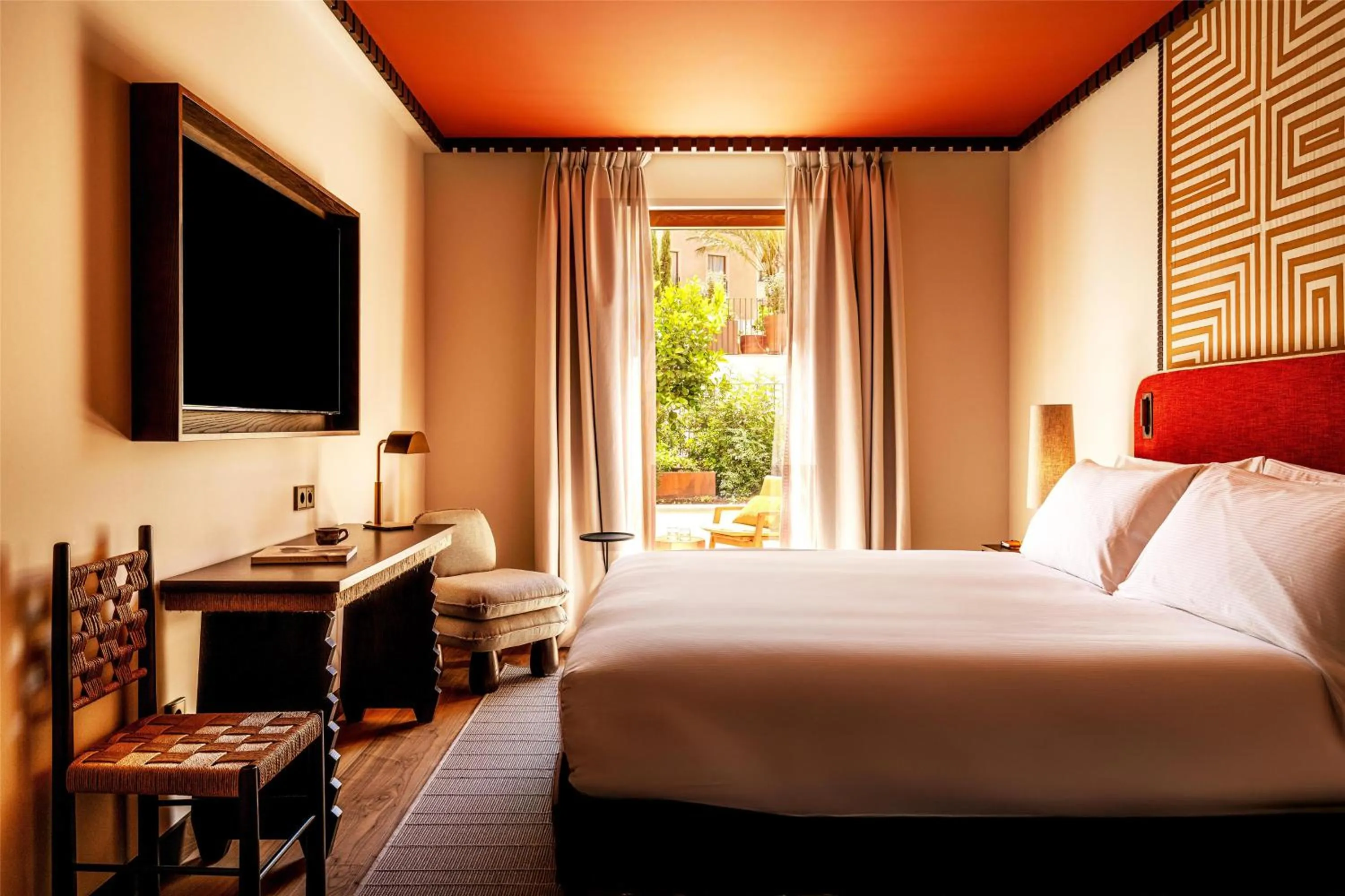 Photo of the whole room, Bed in Palacio De Godoy Caceres, Curio Collection By Hilton