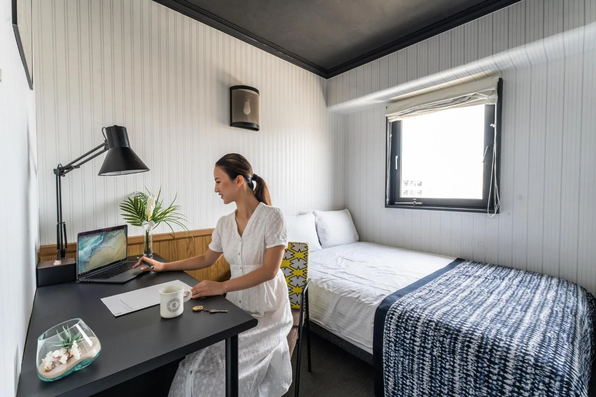 Bed in Estinate Hotel Naha