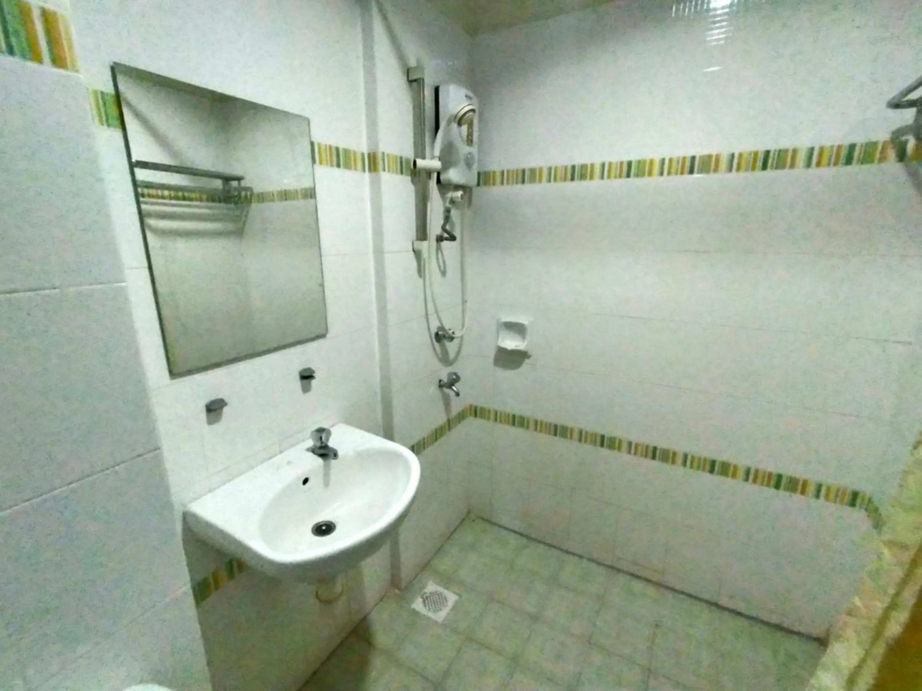 Bathroom in Capital O Suria Urban Escape